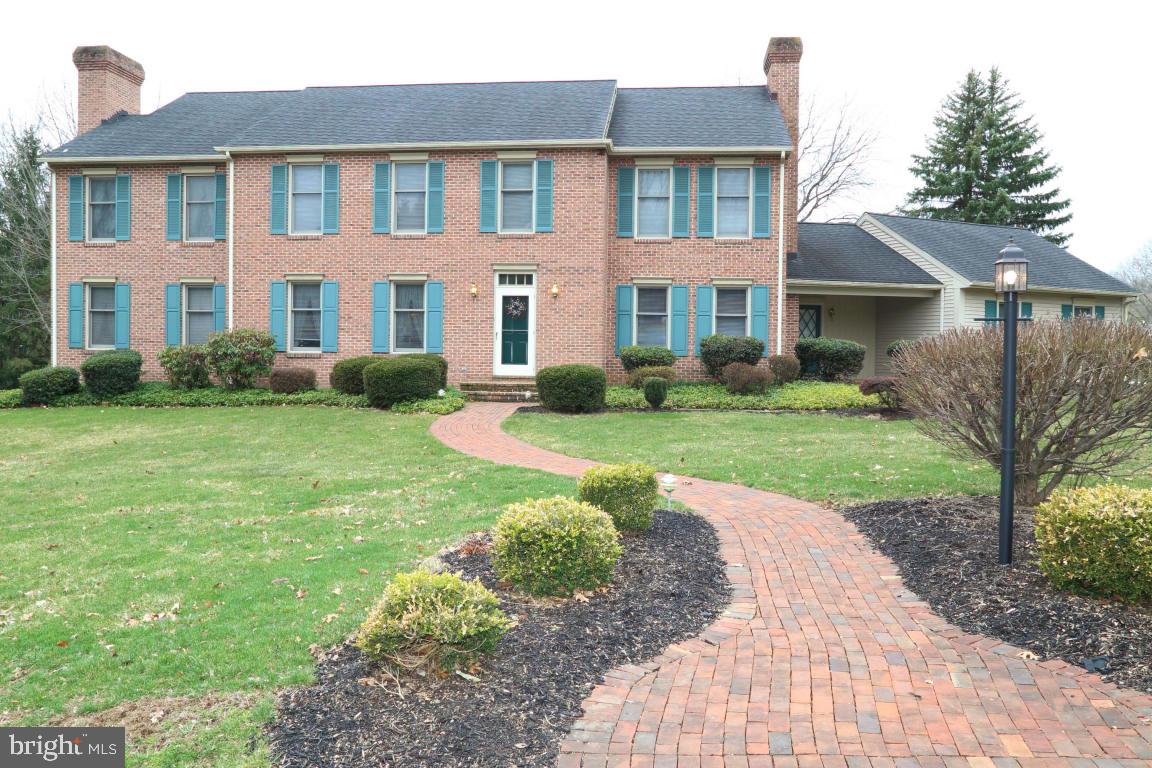 Lovely, well-cared for home on a nicely landscaped lot, large deck. A lot of space, 5 bedrooms, 2 large master bedroom suites. Sunroom with ceramic tile, hardwood flrs, formal dining room, eat-in kitchen. Taxes are based on new assessment .Was recently appraised for $370,000 by local appraiser