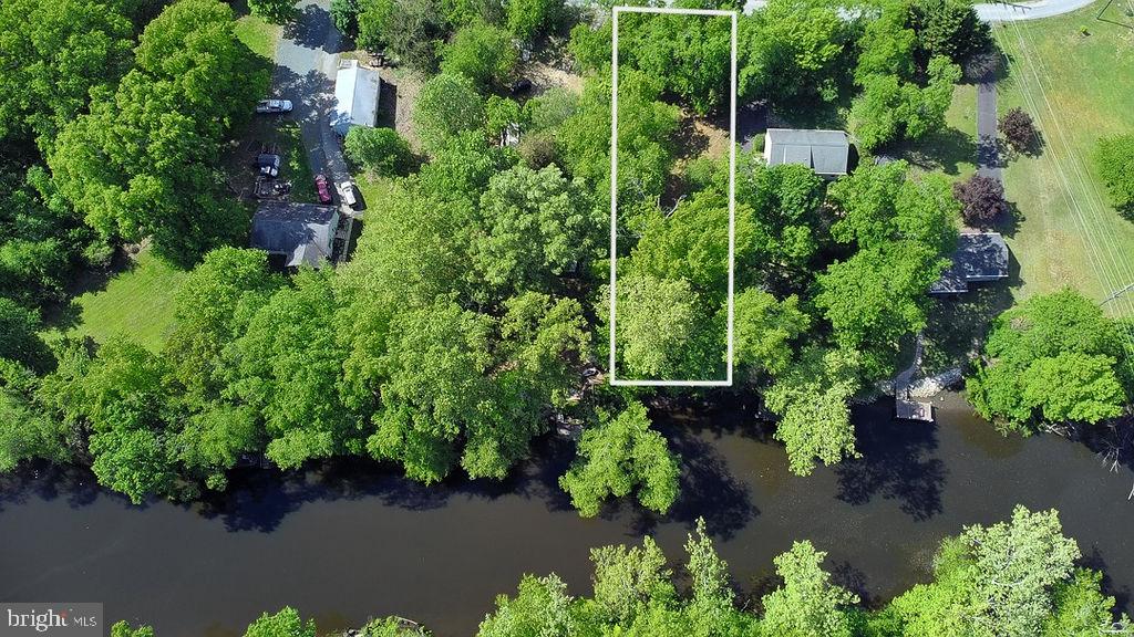 Located on the upper Chester River in Millington, River Bend Lane offers the perfect blend of convenience and waterfront lifestyle just seconds from Route 301 for easy commuting. Skip the hassle and expense of a perc test — the owners have already secured public water and sewer allocation, making the building process that much easier. Enjoy kayaking, fishing, and peaceful river views right from your backyard while surrounded by beautiful natural scenery and abundant wildlife. A rare opportunity to build your dream home with both convenience and waterfront charm.