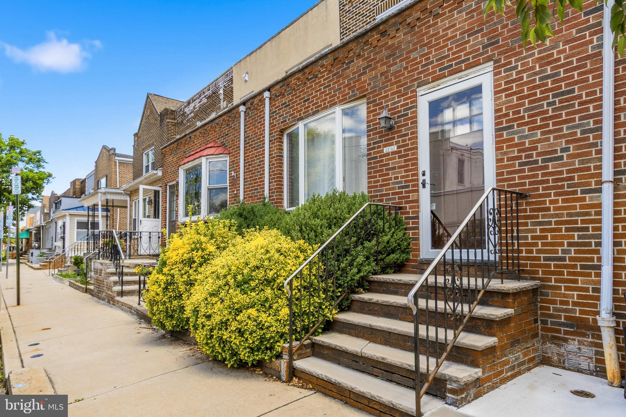 Charming, well-maintained 3-bedroom, 1-bath home in South Philadelphia’s Stadium District, ideally located near major highways, public transit, airports, train stations and the stadiums — an easy drive or Uber to Center City while offering a suburban feel in the city. The home welcomes you with an attractive front garden and enclosed porch; inside, a bright living room with hardwood floors flows to a separate dining room and a classic wood staircase that adds character. An updated kitchen features rich wood cabinetry, granite countertops, stainless steel appliances (gas range, built-in microwave, refrigerator, dishwasher), tile backsplash, and an exterior door for easy yard access. The private yard includes garden and lawn space with rear alley access, and the basement also has a rear egress door. The efficient layout offers three well-sized bedrooms with good closet space and a full 3-piece ceramic tile bath, plus central air. A full, unfinished basement houses mechanicals and the washer/dryer. Move-in ready, this home combines period character with modern updates and everyday comfort. Make your appointment today!