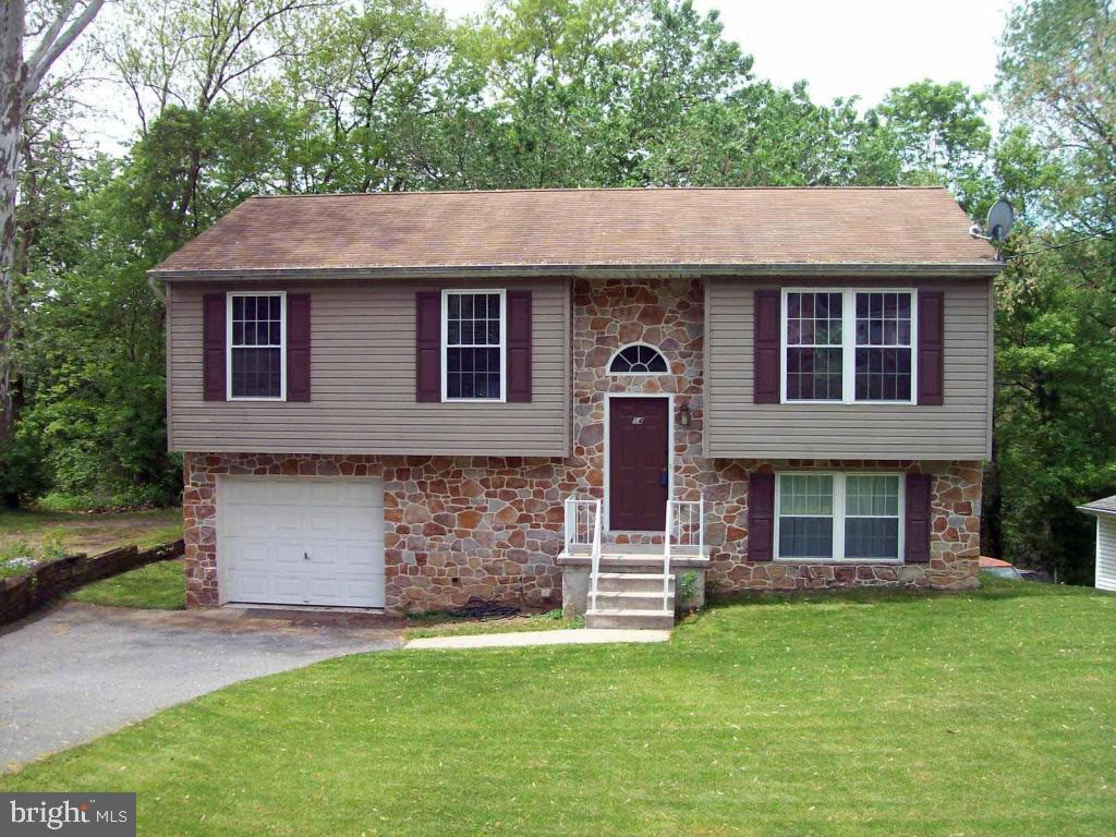 Lower level laundry room has roughed in plumbing for future bath. Walkout lower level, big closets, single home with small yard to maintain.