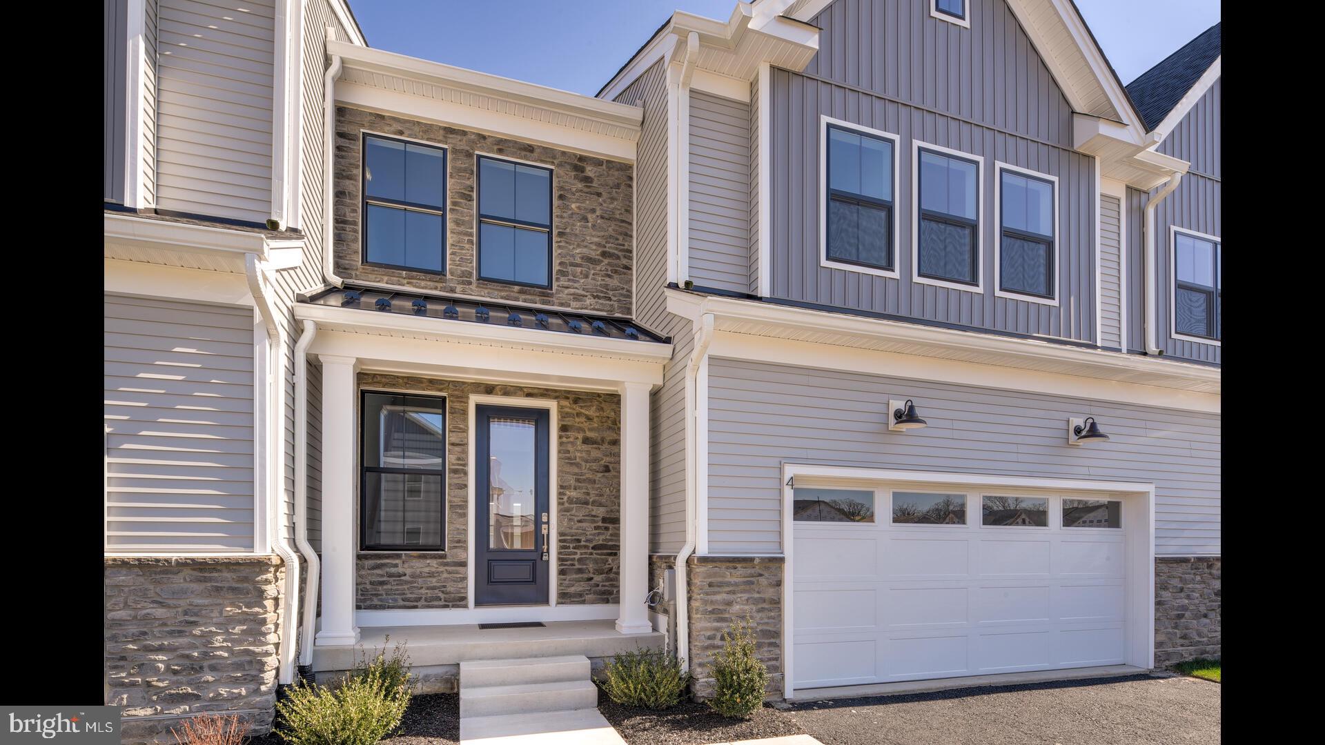 Nestled in the heart of the sought-after Doylestown Walk Community, this exquisite Derby Brandywine model by Toll Brothers with the promise of refined living and unmatched style. The moment you walk through the door, a sense of elevated craftsmanship welcomes you, beginning with the elegant oak staircase that sets the stage for the home's luxurious aesthetic. the two-story foyer which opens to this open floor plan, is made even more expansive with an additional 4 feet of depth. This thoughtful extension ensures that every gathering feels both grand and intimate., an upgraded kitchen with stainless appliances., and granite countertops provide both beauty and functionality complemented by stylish built-ins, 9ft ceilings, and recessed lighting to complete the first floor The second floor of this townhouse includes a primary bedroom that boasts an en suite bathroom that has been meticulously upgraded, offering an oasis for relaxation after a long day. The oversized walk-in closet is ready to accommodate an extensive wardrobe, alongside, two additional bedrooms offering ample space for family or guests, an additional upgraded bathroom ensures convenience and elegance. Second-floor laundry room, is positioned for ease and efficiency, and a bonus loft area that invites endless possibilities. But the list of features does not end here. This home's full walk-out basement presents a canvas waiting for your personal touch. With plumbing already roughed in, the potential for an additional living area is endless. Living in Doylestown Walk, you'll find yourself amidst a community that values beauty, comfort, and convenience. This townhouse is not just a dwelling, it is promising a lifestyle that's both rewarding and inspiring. Welcome to a home that not only meets your needs but exceeds your dreams.