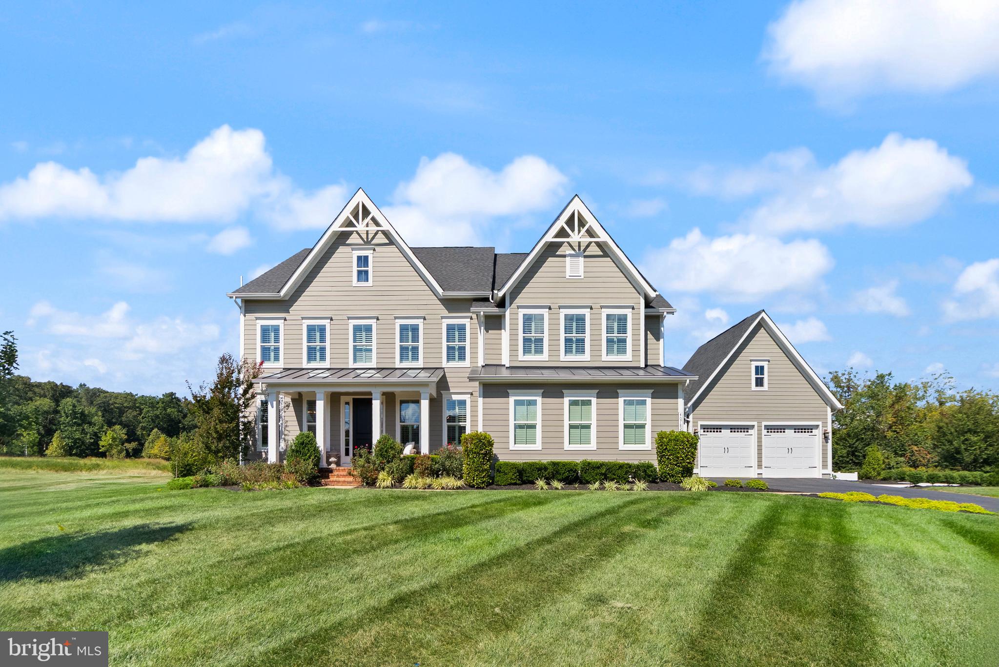 Welcome to the Ritz-Carlton of Willowsford—a showstopping 6 bedroom, 6.5 bath luxury estate perched on one of the most beautiful lots you’ll ever lay eyes on, featuring a serene water view and a backdrop of the Willowsford Conservancy. Every corner of this home has been thoughtfully upgraded, creating a space that’s equal parts elegance, comfort, and “wow” factor.

✨ Unparalleled Outdoor Living
Step outside into your very own resort retreat—complete with a marble hardscape and designer lighting, a sunken natural gas firepit, an outdoor kitchen with built-in gas cooktop and dry bar, a Caldera Cantabria 8-person hot tub, extensive landscaping, organic raised garden beds, and a 15-zone irrigation system. Entertaining here? Pure perfection.

✨ Luxury at Every Turn
Inside, you’ll find fresh paint, brand-new plush carpeting, plantation shutters, upgraded kitchen hardware, and a designer powder room. Enjoy smart living comforts with Phantom retractable screens on the covered porch (remote & app-controlled), plus upgraded designer lighting that sets the perfect mood throughout.

✨ A True Family & Entertainer’s Dream
From the glamorous finishes to the cozy, livable spaces, this is the home you’ll never want to leave. Whether hosting elegant gatherings under the stars, celebrating family milestones, or enjoying peaceful evenings by the firepit, this Stratford Hall model has it all.

📍 Unbeatable Aldie Location
Perfectly situated in sought-after Willowsford, this home combines privacy, beauty, and convenience—offering not just a house, but an extraordinary lifestyle.
This home sits in the award-winning Willowsford Community, surrounded by Loudoun’s wine country. Enjoy resort-style amenities—beach-entry pools, splash pad, lodge, fitness center, dog parks, sledding hill, tree house, and even a farm stand/CSA. Minutes from Brambleton and One Loudoun for dining, shopping, and entertainment, plus nearby Hanson Regional Park (257 acres!), farmers markets, Wegmans, wineries, and breweries. Convenient to Dulles Airport, Silver Line Metro, Tysons/DC, and top-rated Loudoun County schools.