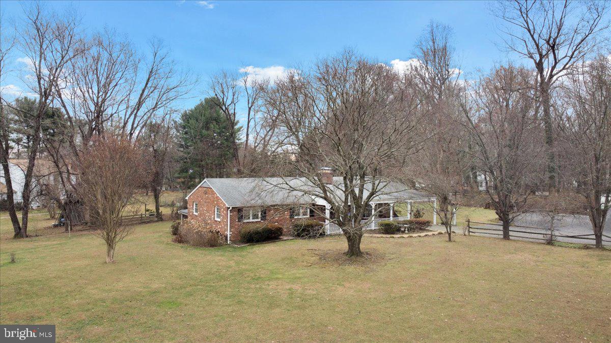 Discover the charm of this beautifully maintained single-family home nestled on an expansive 5.1276-acre lot in the highly sought-after community of Great Falls, Virginia. This residence, cherished by its original owners since its inception, features a blend of timeless elegance and modern updates, making it a perfect sanctuary for discerning buyers.

Step inside to find a warm and inviting atmosphere that has been enhanced with thoughtful renovations over the years. Key updates include a new roof (2011), majority of windows replaced (2010), a spacious family room extension (1989), and meticulous maintenance such as chimney cleaning (2016). The kitchen boasts modern appliances with a microwave (2023) and a dishwasher (2019), while a cozy woodstove (1989) adds to the home's charm. The boiler has been recently serviced, with the oil tank refilled for your convenience (2024), and the septic system was pumped just last year (2023), ensuring peace of mind for years to come.

The home's layout is versatile, featuring a kitchenette in the basement that is currently unhooked, offering potential for customization. The welcoming front door faces west, providing breathtaking sunset views over your private estate.

This unique property comes without the constraints of an HOA, presenting exciting opportunities for expansion. With the possibility of subdividing, you could envision a stunning five-bedroom dwelling on the adjacent lot, subject to a VDOT approval—truly a builder's dream!

To ensure a seamless experience, please schedule all showings online, as the home is owner-occupied and requires advanced notice. We appreciate your interest and look forward to welcoming you to this exceptional property. Don't miss the chance to make this stunning home your own!