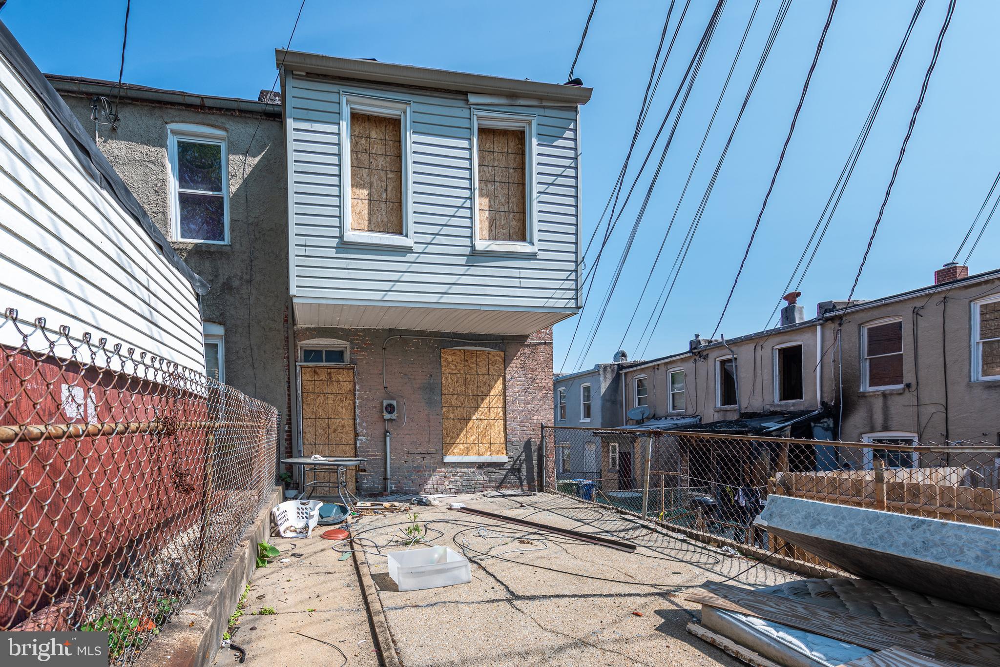 CALLING ALL INVESTORS!  Spacious end of group rowhome that's ready for your renovations.  Property has extensive fire damage and is need of a total renovation.  Great opportunity to renovate and sell or fix up and add to your rental portfolio.  Sold As-Is!  Property will not be trashed out.