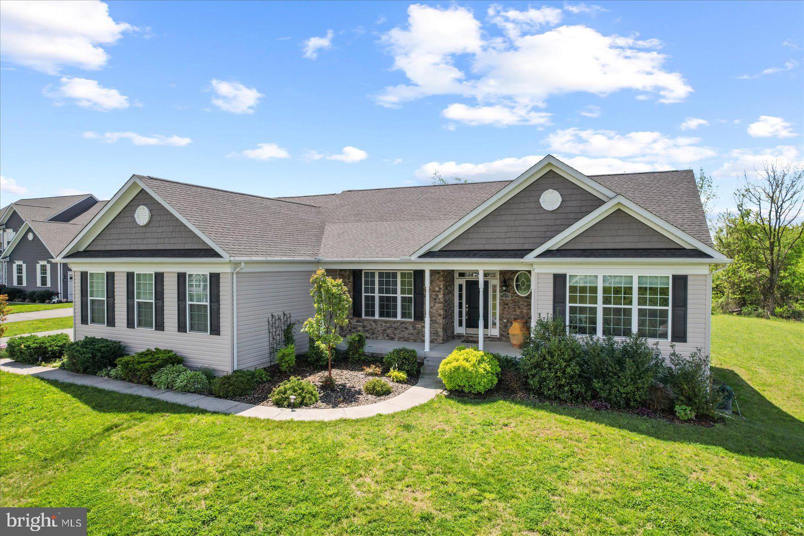 This beautifully maintained, custom built, 2018 by Insignia Homes offers 4 bedroom and 3 full baths, an open floor plan and a deck with a screened in sitting room attached. The bright kitchen is any chefs dream with a gas range, a double oven and stainless-steel appliances. Pull up a stool to wrap around counter or create a breakfast nook overlooking the backyard. Each bedroom comes equipped with double door closets and lots of natural light. The master suite offers not one walk in closet but two and the bathroom a walk-in, tile shower. The basement is the full footprint of the home and is partially finished, waiting for its new owner to create a gaming room, home gym or personal movie theater; the possibilities are endless. A gardeners dream come true as well! Come out today to see this amazing home listed at 7275 Hattery Farm Court. Top of the hill!