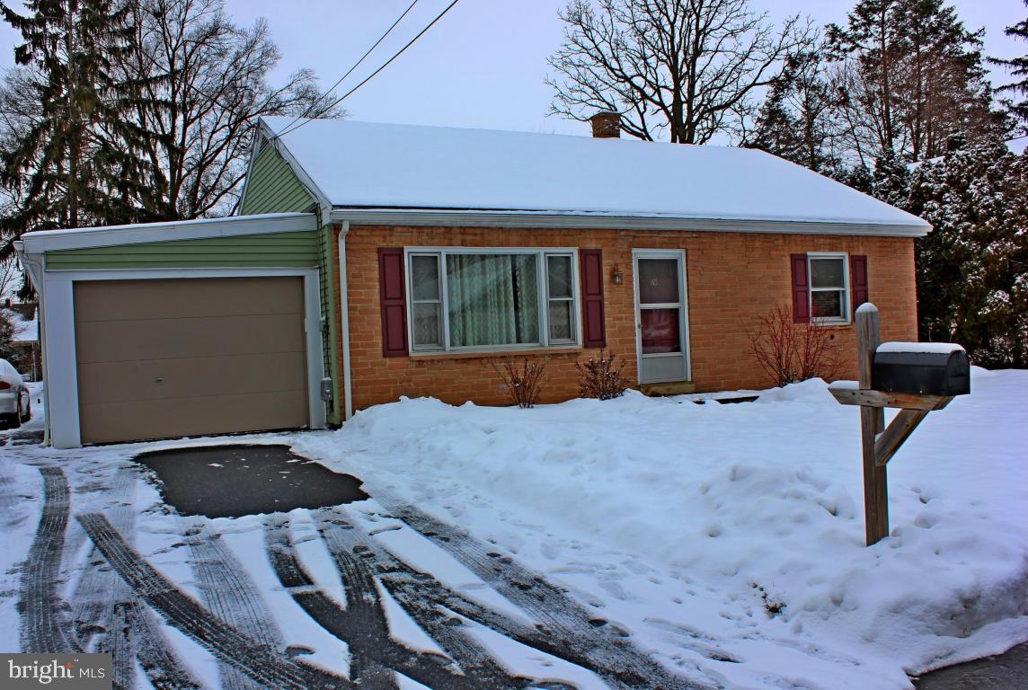 Updated Ranch with Numerous Upgrades- 2 Full Baths, Radiant Floor Heat w/ a Tile Shower, New 200 Amp Service, New Spouting, Newer Furnace, Full Finished Basement w/ Bar, Hardwood Floors, Central Air, Gas Fireplace.