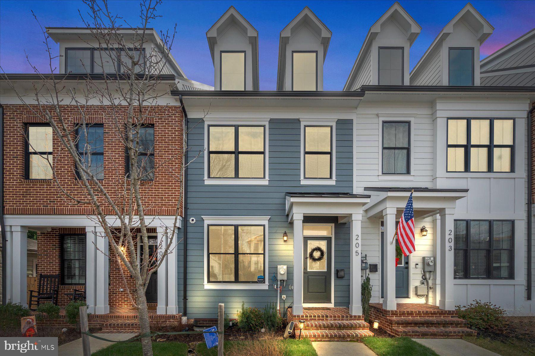 Welcome home to this stunning 5-bedroom, 4-bathroom townhome, offering 3,282 sq ft of thoughtfully designed living space in the heart of Alexandria’s beloved Del Ray neighborhood. With its warm, contemporary finishes and homey, inviting ambiance, this residence is perfect for both everyday living and special occasions.  

Step inside to an inviting open-concept living space ideal for both relaxation and entertaining. The chef’s kitchen, with high-end finishes, flows seamlessly into the living and dining areas, creating a warm and welcoming environment, making it an ideal setting for family gatherings or cozy evenings at home.  

The expansive basement level is a true highlight, offering endless possibilities. Whether hosting lively gatherings, movie nights, or setting up a game room, this versatile space includes a full bedroom and bathroom, a stylish bar, and ample storage for your convenience.  

The middle level features three generously sized bedrooms, including a serene primary suite with a spa-like en-suite bathroom. A full hallway bath serves the additional bedrooms. Upstairs, the top floor presents a cozy bedroom, a convenient half bath, and a spectacular rooftop terrace. Complete with a wet bar, the terrace is perfect for unwinding or hosting unforgettable gatherings.

The home also features a private fenced in outdoor space off the kitchen, two private parking spaces and an electric car charger for modern convenience.  

Located just a short walk from the vibrant Mt. Vernon Avenue, you’ll love the convenience of being near Del Ray’s eclectic mix of shops, restaurants, and community events. The home also features two private parking spaces and an electric car charger for modern convenience.  

This warm and welcoming townhome is a rare gem in one of Alexandria’s most cherished neighborhoods.