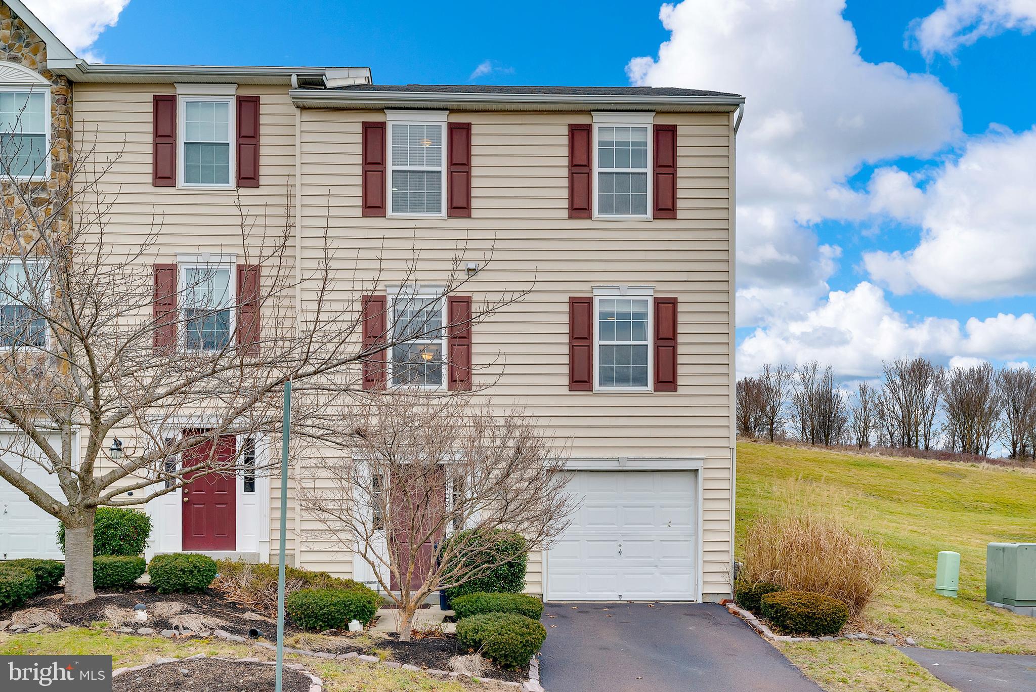 Welcome to 1027 Balley Drive, a 3 BR 2 1/2 bath townhome with garage available for rent starting 3/1 for $2,900/mo. This end unit townhome is situated in the sought after community of The Court at the Ldges and is just a 10 minute stroll from the heart of Phoenixville. The entrance leads you into a spacious foyer with access to the garage and huge first floor storage space. Upstairs you'll find an open floor plan perfect for entertaining, with the kitchen opening both into a designated dining area and spacious living room. Continue upstairs to find a master suite featuring a full bath and generously-sized walk-in closet. Two additional bedrooms, a hall bath and laundry complete this floor. This home also boasts a great outdoor space, complete with a private deck ideal for your summer cookouts. You'll love how convenient the location is with so many great restaurants, shops and community festivals. It's also an easy commute to Collegeville and the Providence Town Center shopping complex. Blackrock Sanctuary and the Schuylkill River Trail are just moments away for nature lovers. Make your Phoenixville dreams a reality and book a showing today!