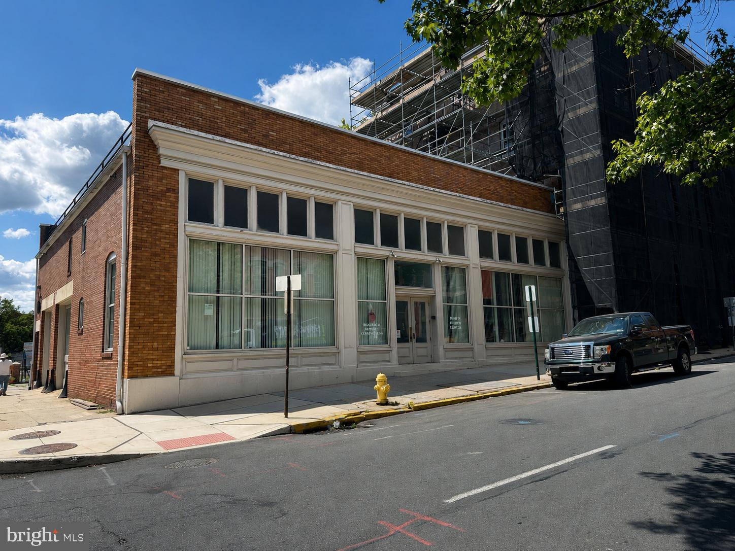 Prominent corner-location commercial property at S. 4th and Cherry offering over 4000 sqft of flexible space for a variety of business uses.  Large foyer area, two bathrooms, multiple offices on the main floor, and additional office space on the second floor, creating opportunities for a variety of professional, business, or mixed-use opportunities. High ceilings add to the open feel, as well as a large stone foundation basement which provides excellent storage space.