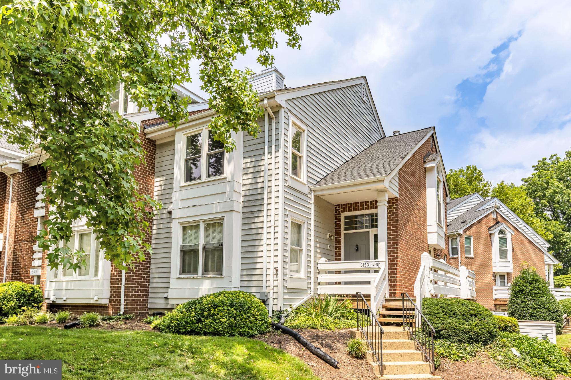 Welcome to this beautifully updated end-unit condo in Falls Church that lives like a townhome, complete with its own private entrance. Offering 1 bedroom and 1 bathroom, this move-in-ready home features a bright, open floor plan filled with natural light and a sliding glass door leading to your private balcony.

The kitchen has been refreshed with all brand-new appliances, while brand-new carpet throughout and fresh paint give the entire home a crisp, modern feel. Cozy up by the fireplace, enjoy the built-in reading nook or home office, and appreciate the additional storage tucked beneath the staircase. A full-size washer and dryer add everyday convenience. One parking spot included. 

Residents of The Cove enjoy an array of amenities, including scenic walking trails, a private lake, beautiful wooded views, a community pool, and a clubhouse—all while being conveniently located near shopping, dining, and major commuter routes.