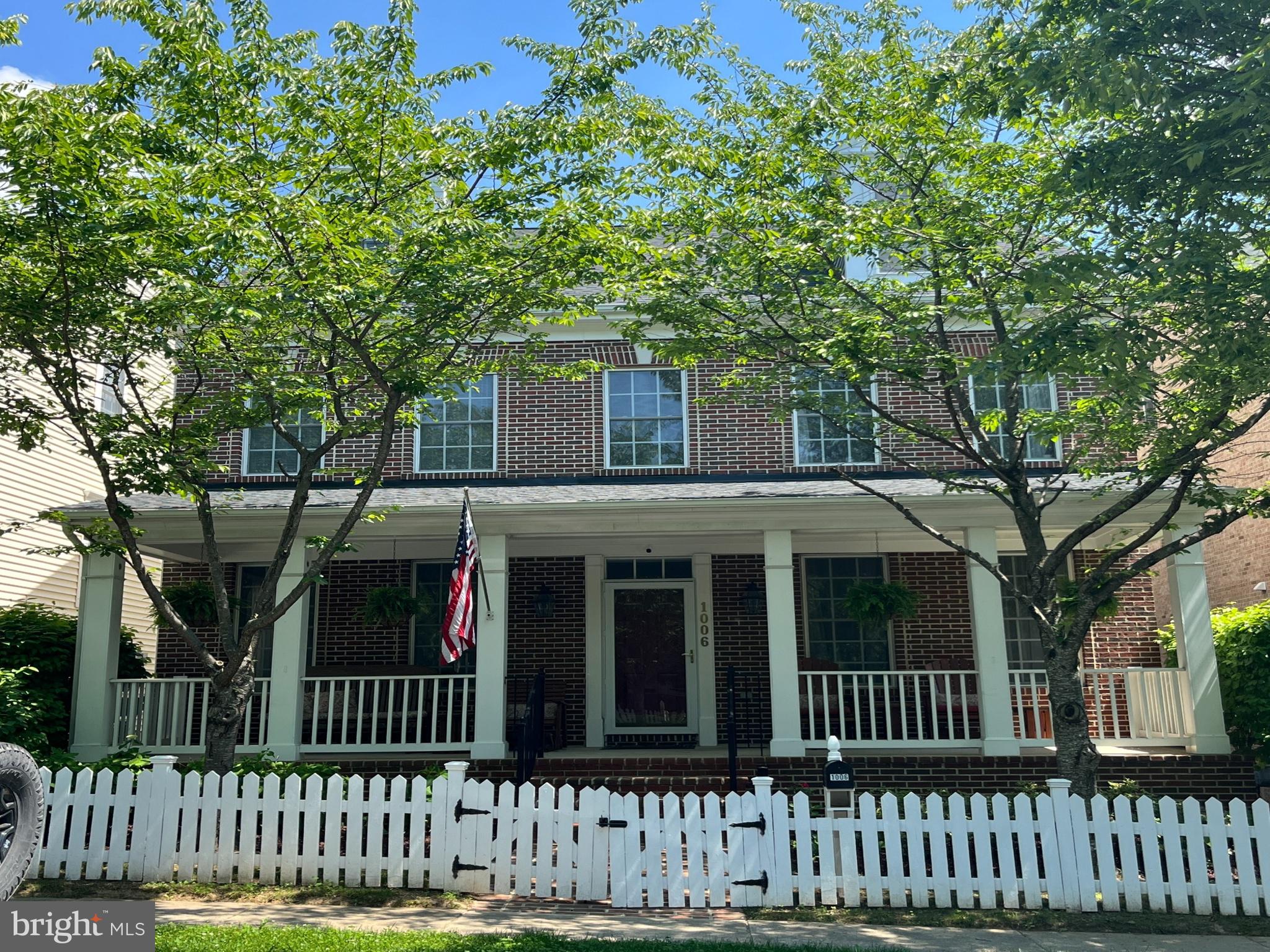 Welcome home to this stunning King Farm Irvington Center gem in Rockville! This beautifully maintained brick-front home offers 3 finished levels plus a basement, blending elegance, comfort, and flexibility in one incredible package. From the charming white picket fence and welcoming front porch to the sun-filled interior, this home is full of warmth and personality.
Inside, you’ll find oversized windows, recessed lighting throughout, cozy spaces to gather, and a gas fireplace perfect for relaxing evenings at home. The spacious layout features 4 bedrooms, 3 full bathrooms, and 1 half bath with room for everyone to spread out and enjoy.
The dreamy primary suite feels like a private retreat with elegant French doors, two walk-in closets, and a bonus sitting area ideal for a home office, lounge space, or reading nook. Upstairs laundry adds everyday convenience, and the third level offers a fantastic private guest suite complete with a full bath, perfect for visitors, multigenerational living, or flexible workspace needs. Ceiling fans throughout the home keep the air flowing and the atmosphere comfortable year-round.
Thoughtful updates include Updates include: Roof (2021), Trex Deck Built (2024), Hot Water Heater (2023), HVAC and 1 AC Unit (2022) 2nd AC Unit (2020). 
And here’s the showstopper,  qualified buyers may have the rare opportunity to assume the existing VA loan at an incredible 2.38% interest rate! Seller must have VA Eligibility Restored. 
All of this in the highly sought-after King Farm Irvington Centre, just moments to shopping, dining, parks, Metro access, and everything Rockville has to offer. This home checks every box and then some!