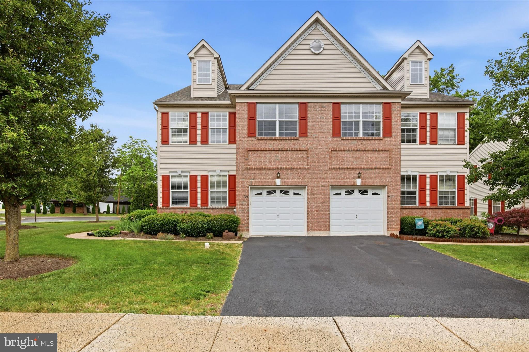 Stunning twin-style end unit townhome in sought-after Heather Meadows Community. Welcome to this beautifully maintained end-unit townhome nestled in the highly desirable community of Heather Meadows. From the moment you step inside, you'll be captivated by the warmth and elegance of rich hardwood floors that flow throughout the entire home. The thoughtfully designed first floor offers a formal living room and dining room perfect for entertaining, alongside a breathtaking two-story great room anchored by a cozy gas fireplace. The  eat-in kitchen is a chef's dream, featuring a pantry, plenty of cabinet and countertop space, and premium stainless steel Bosch appliances — a true upgrade. Upstairs, the second floor is home to three generously sized bedrooms, each showcasing the same beautiful hardwood floors found throughout. The luxurious primary suite is a true retreat, boasting  vaulted ceilings, his-and-her closets, and a spa-inspired en-suite bath complete with double sinks, a walk-in shower, and an indulgent soaking tub. A second full bath and a conveniently located laundry room round out the second floor hallway. Venture up to the loft level, where a thoughtfully converted fourth bedroom suite awaits — complete with its own private full bath and a dedicated mini-split system for year-round comfort, keeping the space perfectly cool on even the hottest summer days. The expansive unfinished basement presents an incredible blank canvas brimming with potential. Already framed and drywalled, this space is ready for your vision — whether you dream of a home theater, gym, recreation room, or additional living space.  Simply add your finishing touches to the ceiling and flooring to truly unlock this space. Complete the picture with a private one-car garage and a spacious deck — ideal for outdoor dining, relaxing, or entertaining guests. This exceptional home truly has it all — space, style, and an unbeatable opportunity to make it your own. Don't miss your chance to call Heather Meadows home!