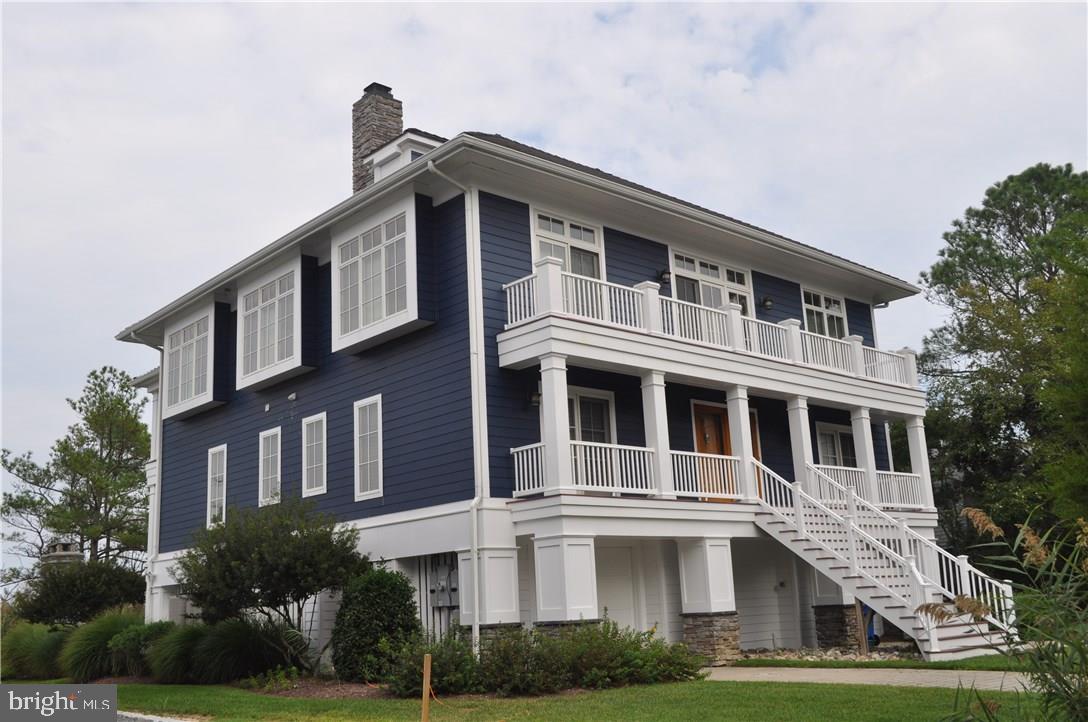 SPECTACULAR ONE-OF-A KIND NORTH SHORES BEACH House! This home backs to the state park and enjoys lovely views of the Atlantic Ocean and Gordon's Pond! No expense was spared as this home was meticulously designed to provide casually elegant comfort and style. It features 6 bedrooms (3 masters), 5 full baths and 1 half bath, a kitchen any gourmet chef would die for, 3 indoor fireplaces, lovely porches that provide indoor/outdoor living, multiple decks, an outdoor kitchen with stone patio & fireplace, elevator, security system, irrigation, golf cart, outdoor showers and a doggy wash too!