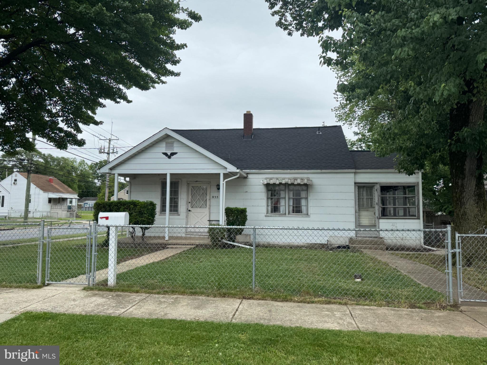 Invester alert. Home is in need of some updating. Recent updates include Roof and Hvac. The main floor has a covered front porch. Good size kitchen with a separate laundry room, living room, first floor bedroom and den. The living room has wood floors, there are wood floors under the carpet in the remaining rooms. Upstairs there are two additional bedrooms. This is a corner lot with a large fenced in yard and a two car garage. Home is being sold as is.