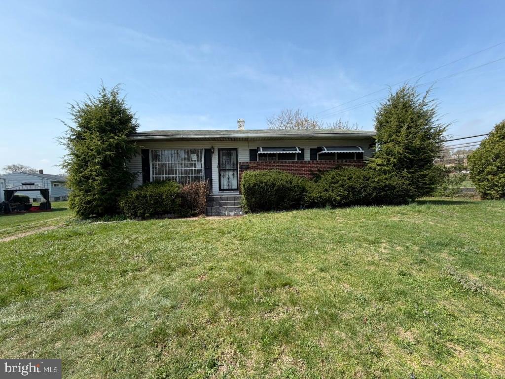 Don't miss this charming, single-family rancher that sits on a quiet street in a neighborhood with other very well-maintained homes. Easy access to all the things you love about city-living: close to the beltway, major thoroughfares, shops, restaurants, schools, hospitals and public transportation. This home offers one-floor living and flows easily from room to room. With a large living room featuring large windows for lots of natural lighting, a separate dining room with lots of table space, spacious kitchen with a door that leads you the side yard and the basement. The three generous sized bedrooms and one full bath completes the main level.  The finished basement features a laundry area, workshop area and a half bath. The backyard offers a covered rear patio with a large yard, ideal for barbecues with family and friends this summer and/or for entertaining or just relaxing. Lots of off street parking due to long driveway. With solid bones and classic Baltimore charm, this property is your blank canvas to renovate and transform into a rental, resale, or personal residence - a great opportunity to create the perfect home just for you! Prime Location: Located in the desirable neighborhood of Baltimore, and minutes from Morgan State, Loyola, Towson Universities, Hospitals, Mount Pleasant Golf Course, downtown Baltimore, and much more!