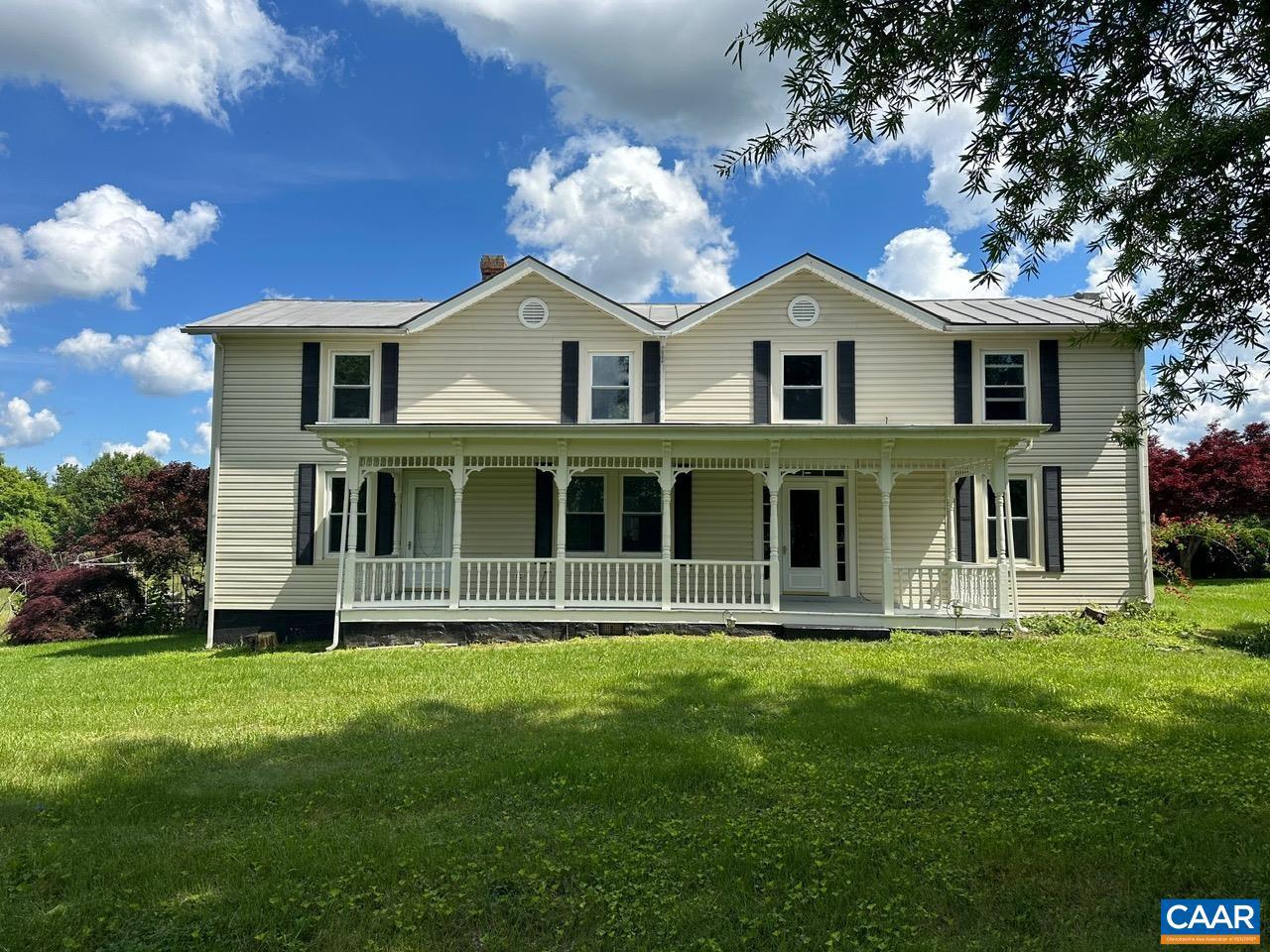 Charming Renovated Farmhouse nestled on a 4 + acre corner lot in the heart of Barboursville. The property combines the charm of a historic farmhouse with modern amenities, making it a perfect blend of old and new. The extensively renovated home boasts 4 spacious bedrooms, 4 full baths, a newly remodeled kitchen open to the dining area, hardwood floors & luxury vinyl plank throughout. Outdoor spaces include the large covered front porch & expansive stamped concrete patio. Car enthusiast will love the conditioned 4 bay attached garage, 1-car detached garage, and spacious outbuilding for additional storage. Enjoy the serenity of rural living while being close to all the conveniences Barboursville has to offer. Don't miss the opportunity to lease this distinctive property with ample space and versatility. Schedule your visit today!