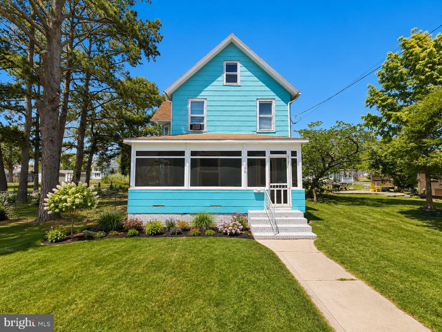 Welcome to 108 W Chesapeake Avenue in the heart of Crisfield, Maryland, known as the "Crab Capital of the World" and gateway to the beautiful Chesapeake Bay. This charming 3-bedroom, 1.5-bath home offers a blend of historic character and recent updates, making it a great opportunity for homeowners, investors, or those looking for a coastal retreat.

Step inside and be greeted by the beautiful original hardwood floors, a spacious foyer, and a stunning solid wood staircase that showcases the home's timeless craftsmanship. The main level features a large living room that flows into an expansive family room, providing plenty of space for gathering and entertaining. Toward the rear of the home, you'll find a generously sized kitchen, dining room, and convenient utility room.

Upstairs offers three comfortable bedrooms and a full bathroom. Outside, enjoy relaxing on the screened wraparound front porch, perfect for taking in the coastal breeze without the bugs. The manageable yard includes a fenced area ideal for pets, gardening, or outdoor enjoyment.

Located just minutes from Crisfield's waterfront, marina, restaurants, festivals, and ferry service to Smith Island, this home provides easy access to the Eastern Shore lifestyle. Whether you're looking for a primary residence, vacation getaway, or investment property, this home is full of potential.

Property is being sold As-Is. Schedule your private showing today!