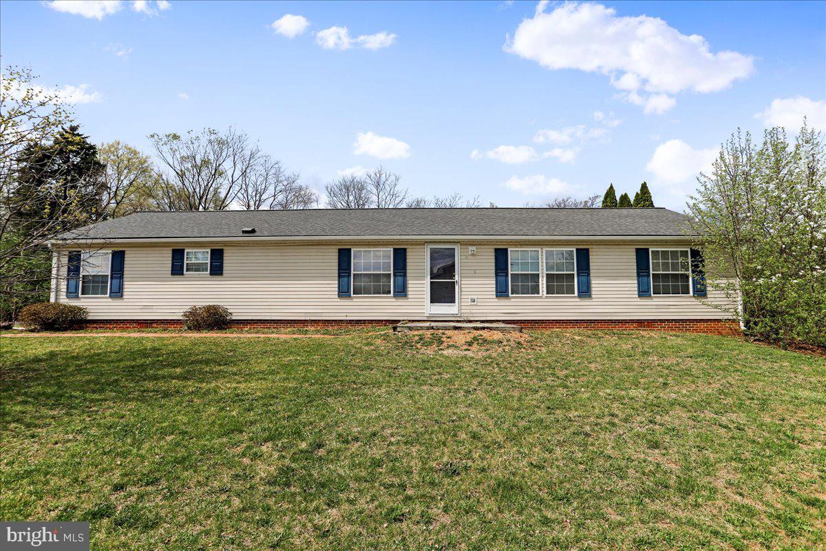 This updated manufactured home is an inviting and spacious property, offering the perfect combination of comfort and privacy. This home offers over 1700 square feet is located on a private .50-acre lot at the end of a peaceful cul-de-sac, and boasts 3 bedrooms and 2.5 bathrooms, making it ideal for families or anyone looking for large living areas. Upon entering, you’ll find a warm and welcoming family room with a cozy wood-burning fireplace, perfect for chilly evenings. The home features newer LVP flooring in both the kitchen and bathrooms, offering a modern and low-maintenance look. The master bedroom is complete with a private ensuite bath for your convenience and privacy. Each of the additional bedrooms offers generous space for families or guest rooms. The central heating (with gas back up) and air conditioning ensure comfort year-round, while a separate storage shed on the property provides additional space for tools, outdoor equipment, or personal storage.