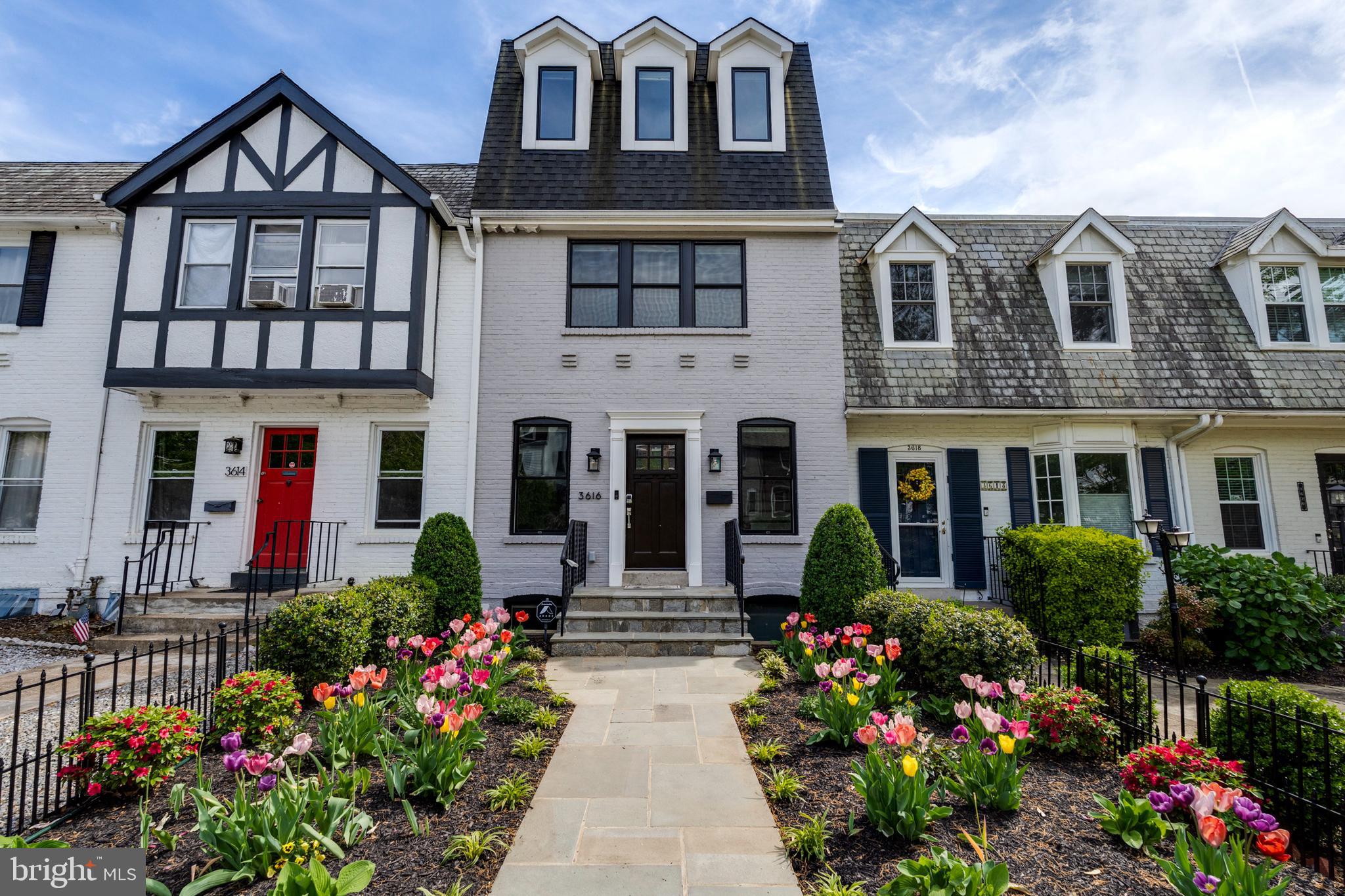 FULL SIZED TWO CAR DETACHED GARAGE. Welcome to this timeless and impeccably maintained rowhome in Burleith. Thoughtfully redeveloped by HAS Builders in 2018, this 5 Bedroom 5.5 Bath + ELEVATOR home has everything you could possibly desire within walking distance of Georgetown. Every bedroom has an en-suite bathroom. No expense was spared in this development and the materials go far beyond what you typically see with stunning crown molding and carpentry details in every room, genuine marble countertops and bathroom tile, designer wallpaper, and millwork coffered ceilings. The main level is perfect for entertaining with a living room, family room, dining room, and chef's kitchen all hooked up to the whole house SONOS audio amplifier system. The fully-finished walkout basement includes a separate kitchen, gym, and bedroom with an egress window and full bath. The home office of your dreams resides on the third floor with a private balcony and espresso bar.

Take in views of green parks and city landmarks on the stunning private rooftop terrace complete with an outdoor TV and gas fire pit. The home includes two balconies and a private backyard patio.

This home is one of only several in the neighborhood to have a true detached two-car garage complete with an electric charger. It can fit two full sized SUV's. Don't miss your opportunity to purchase this breathtaking home.