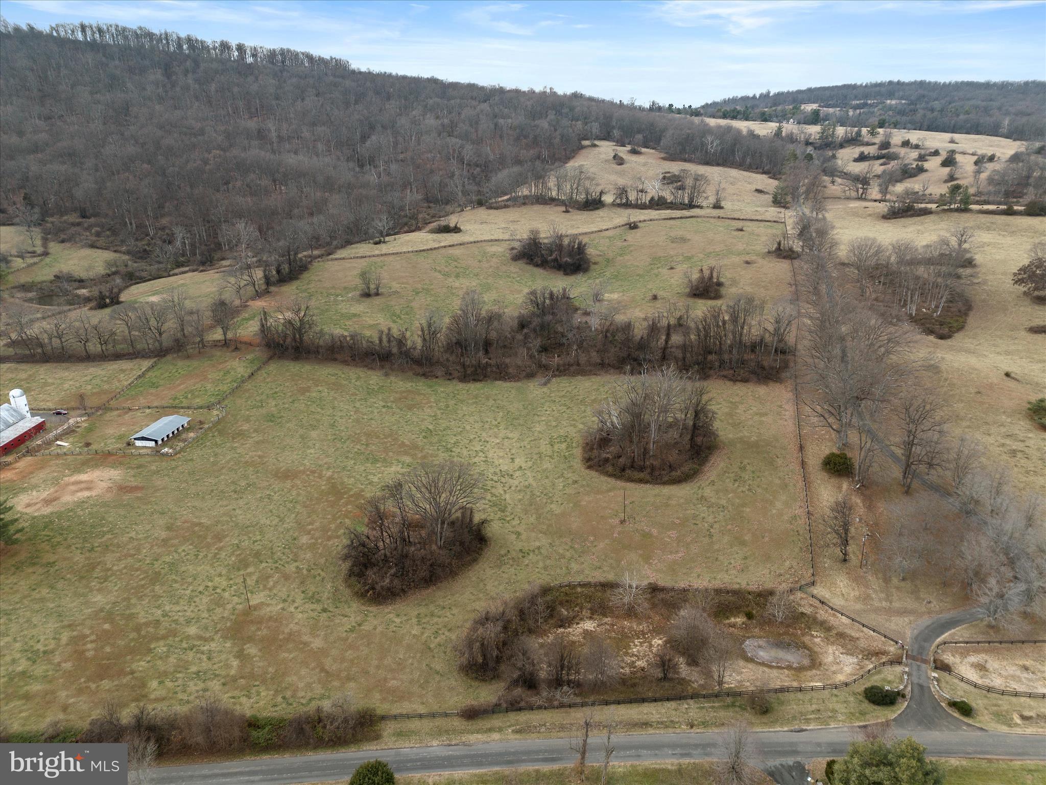 Stunning and Beautiful 57-acre parcel in the heart of horse country. Property is in VOF easement. This is a separate lot of a large estate being offered. Rolling hillsides with spectacular views Morningside equestrian farm across the street. Small pond on the property and views of other neighboring ponds. Mountain views to the east. Paved road frontage. This is truly a special lot and one of a kind.