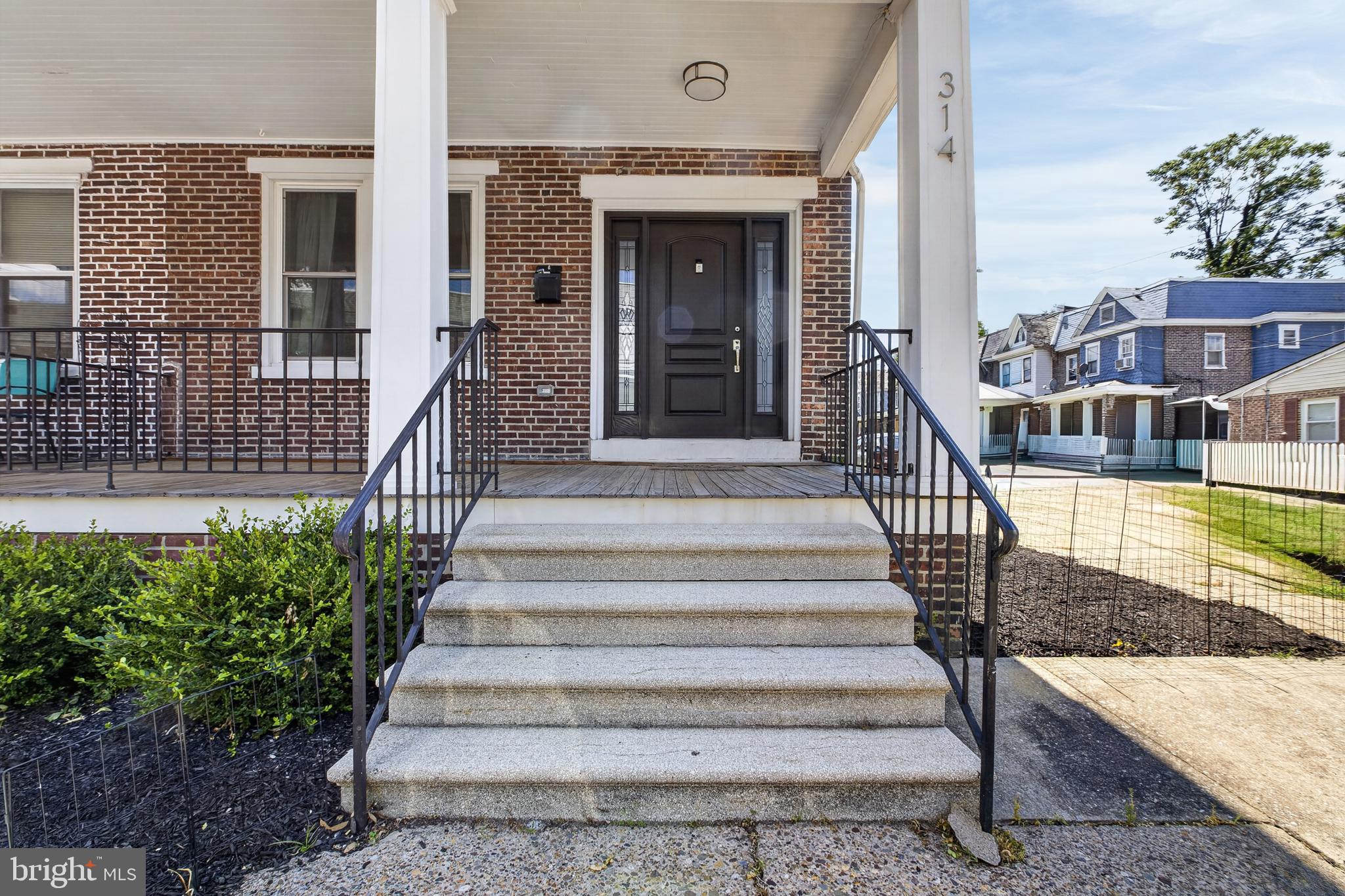 Welcome to 314 W. 28th Street, a beautifully maintained corner-unit home offering 3 bedrooms and 3 bathrooms (1 full and 2 half baths), approximately 1,950 square feet of versatile living space in the heart of Wilmington. As you approach the property, you'll be greeted by extra-wide front steps leading to a spacious 150-square-foot covered porch—the perfect place to relax, unwind, and enjoy your morning coffee or evening conversations.

Step inside to an inviting open-concept main level designed for both everyday living and effortless entertaining. The first floor boasts a bright and spacious living and dining area, a convenient main-floor laundry room, mudroom, and a powder room for guests.

Upstairs, you'll find three generously sized bedrooms and a full bathroom, providing comfortable accommodations for family and guests alike. The fully finished lower level expands your living options with a large recreation room, an additional powder room, and a separate entrance—perfect for a home office, gym, media room, guest space, or additional living area.

This move-in-ready home also features an attached garage with off-street parking and has been meticulously maintained, offering the perfect combination of comfort, convenience, and flexibility. As a desirable corner unit, you'll enjoy added privacy and an abundance of natural light throughout.

Conveniently located near major highways, shopping, dining, parks, and downtown Wilmington, this is an opportunity you won't want to miss. Schedule your private tour today and discover all this beautiful home has to offer!

Some photos may have been digitally enhanced.