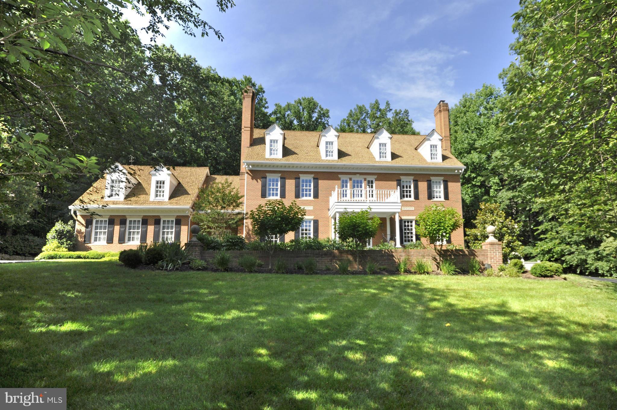 Stunning colonial on 4 luxurious levels! Wonderful layout w/ large public rooms, cherry-paneled study, chef's kitchen, main level guest/in-law suite, expansive master suite, large, finished third level w/ BR, FB & FB. Walkout LL with large rec room, gym & full bath. Backyard w/ a pool and cabana w/ outdoor fireplace. Extensive upgrades inside & out. Recently re-landscaped. 3-car garage.