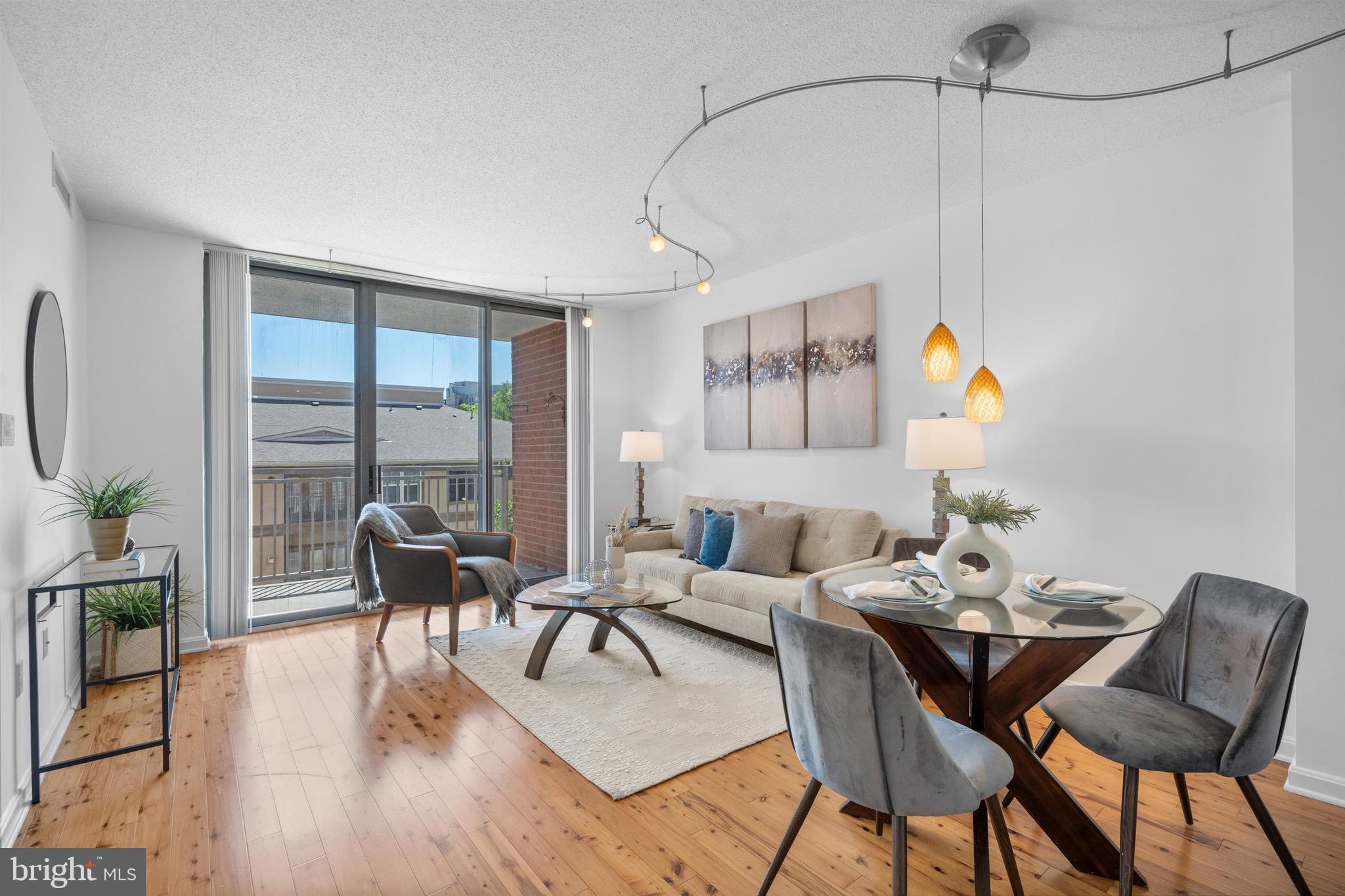 Back on market through no fault of the seller or property. Previous contract terminated due to buyer financing, creating a new opportunity for a qualified buyer. Don’t miss this beautifully refreshed, light-filled residence, one of the few east-facing one-bedrooms in the building. This residence offers a clean, modern feel with an open, functional layout.

The entry opens to an lovely kitchen with crisp cabinetry and a full appliance suite. The living area featuring hardwood floors, oversized windows and morning light, opens to an expansive balcony. 

The spacious bedroom includes generous closet space and a well-appointed bath with an oversized vanity and tub-shower combination. Fresh finishes make it move-in ready, with in-unit laundry for everyday ease. The residence includes one assigned garage parking space and two storage lockers.

Ideally located with easy access to shopping, dining, Metro, and major commuter routes. Building amenities include a 24-hour concierge, outdoor pool, patio, tot lot, billiards room, meeting room, resident lounge, fitness center, and on-site management. Directly across from North Bethesda Metro Station and moments from Pike & Rose, with Whole Foods and Wegmans both nearby.