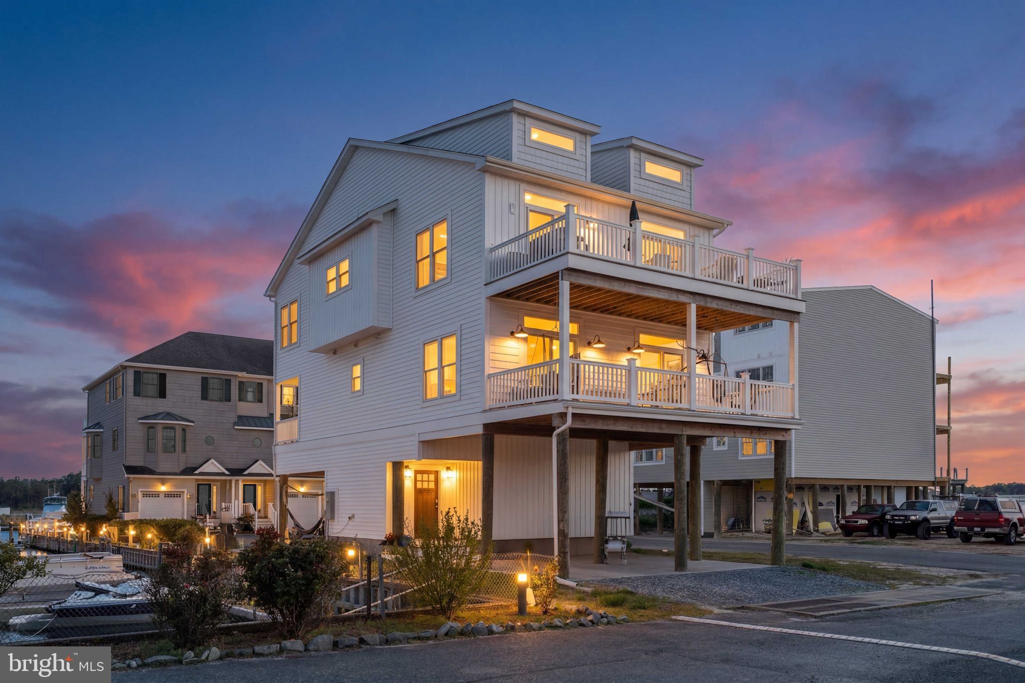 Welcome to a true boater’s paradise at Pingally Point, where luxury meets coastal living. Perfectly situated less than three miles from Bethany Beach, this exceptional residence conveys with a deeded deep-water boat slip, offering effortless access to the open water and an unmatched waterfront lifestyle.

Just 2.5 years young, this thoughtfully designed four-bedroom home showcases an elegant inverted floor plan, capturing breathtaking water views from nearly every vantage point. The main living level is designed for both refined entertaining and relaxed living, highlighted by a sun-drenched, designer kitchen featuring an expansive island, premium finishes, and seamless flow into the living and dining areas.

The home continues to impress with spa-inspired bathrooms adorned with custom tile showers and hand-selected quartz countertops, delivering a sophisticated, high-end finish throughout.

Beyond the home, immerse yourself in the best of coastal Delaware—boating, beach days, and nature all at your doorstep. Enjoy close proximity to the James Farm Ecological Preserve, scenic biking trails, and a curated selection of local restaurants and boutiques.

This is more than a home—it’s a lifestyle defined by water, luxury, and location.