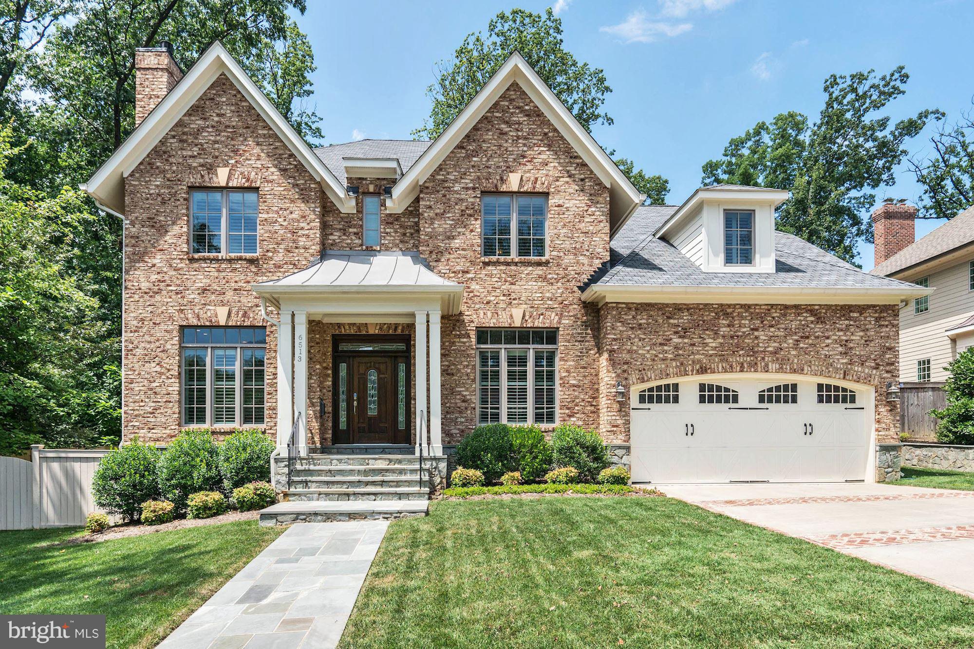 Gorgeous custom home w/ top-of-the-line finishes throughout. Over 6,500 sq ft on three levels. Gourmet kitchen opens to family room & sunroom. 5BR/4.5BA. Master suite w/ gas fpl, spa-like bath & private deck. Expansive lower level w/ rec room w/ wet bar, exercise room, gym & guest suite. Fabulous backyard features a flagstone patio, built-in BBQ & outdoor fireplace. Better than new!