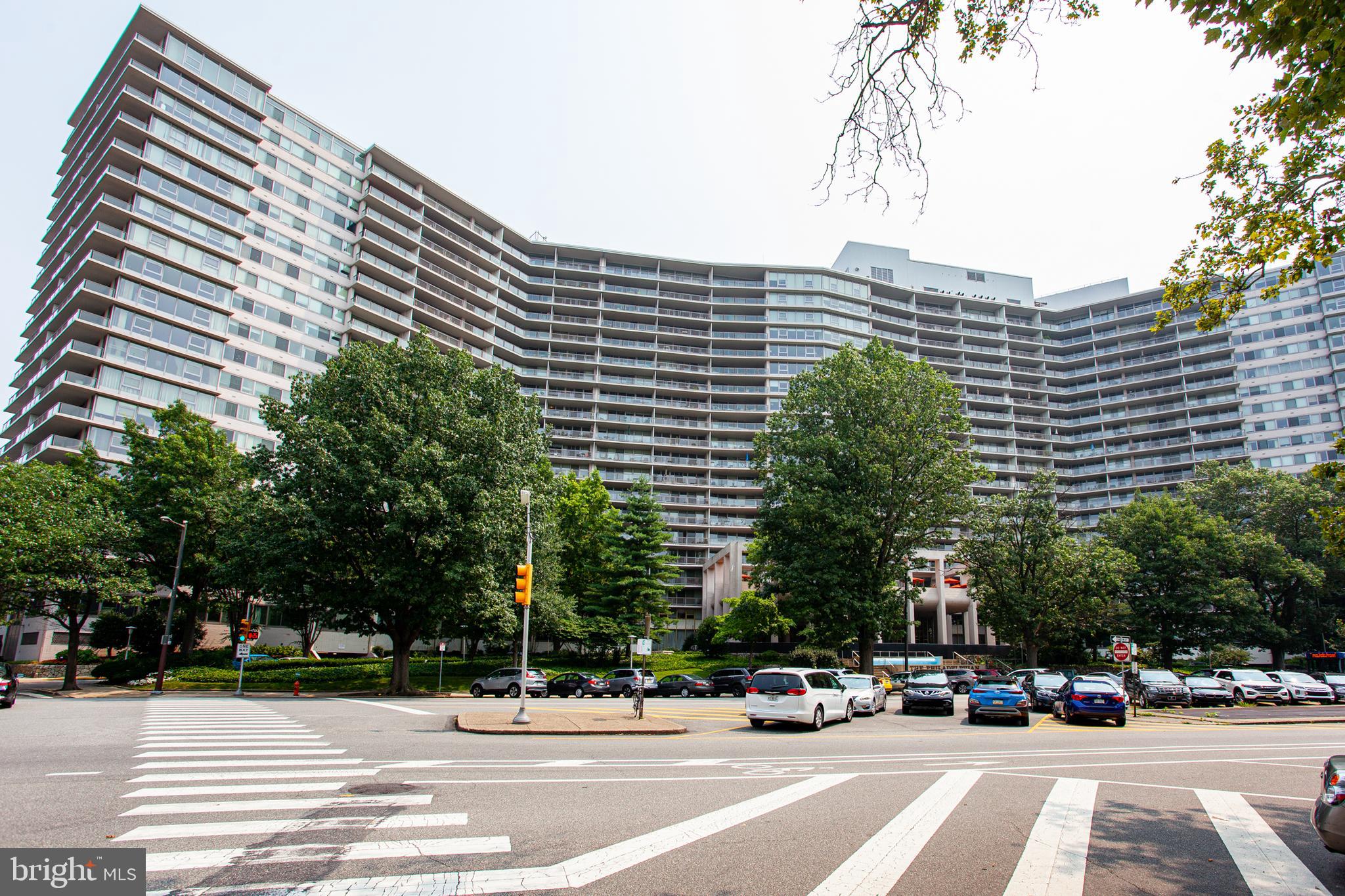 This corner unit at The Philadelphian has two walls of windows overlooking the Fairmount neighborhood with over 1600 square feet of living space.  The B wing locations provides the resident with quick no steps access to the lobby and commercial shopping area. The second floor is also where the social room and library are located. The unit has been freshly painted. It needs some TLC but is basically move in ready. All utilities, basic cable, wifi, pool membership, fitness center are included in the HOA fee. There is bus service around the city six days a week, 24 hour doorman and concierge service. The commercial corridor has a pharmacy, grocery store, restaurant/bar, beauty parlor, bank and more. All your needs are just an elevator ride away. There is garage valet parking on a first come first serve basis for $190 a month.  The building has a no smoking no pet ( except service animals ) policy. This spacious apartment could be your next home.