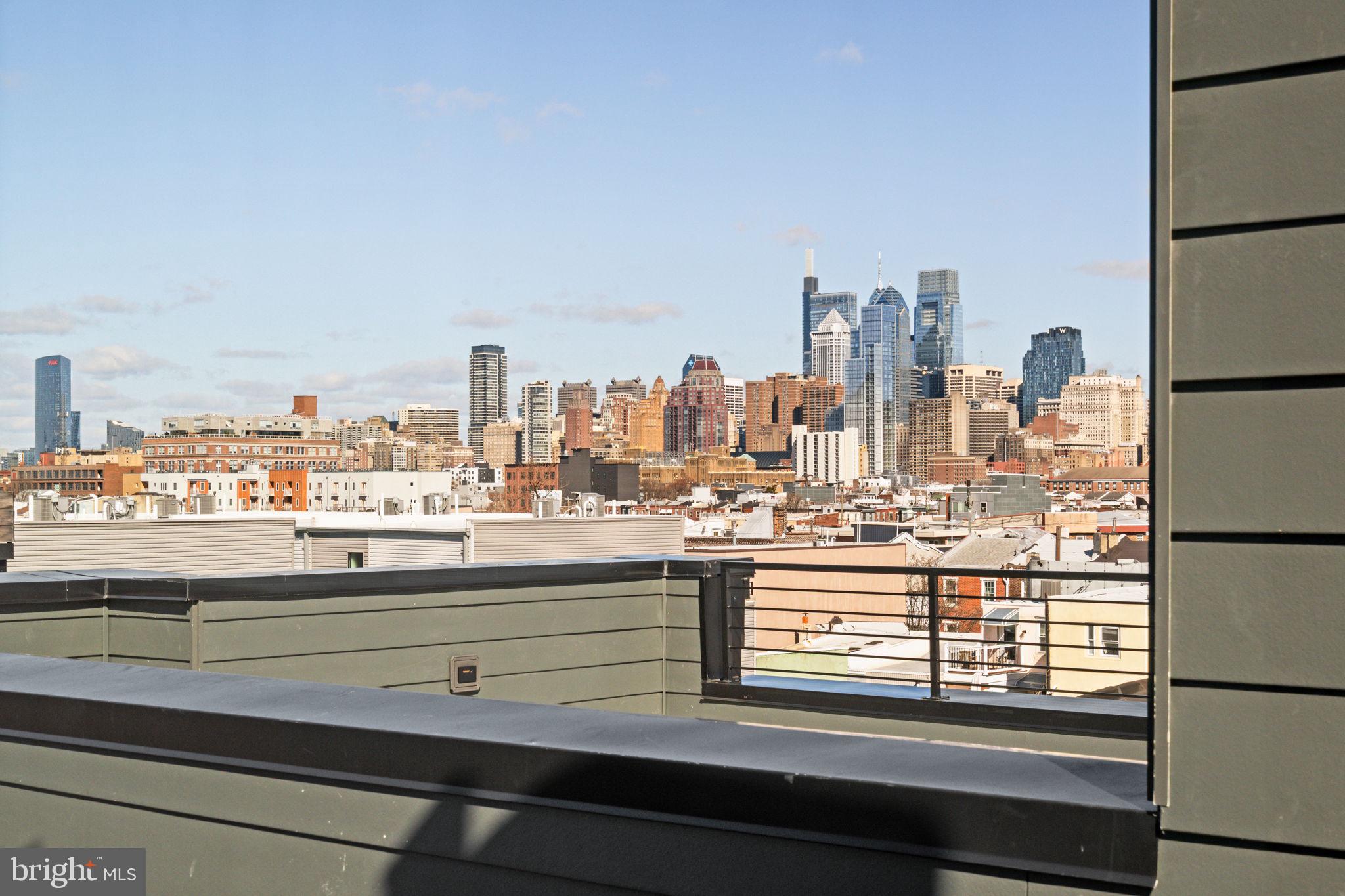 Welcome to Unit I at Passyunk Crest, a thoughtfully designed townhome offering an exceptional blend of space, modern design, and long-term value in one of Philadelphia’s most desirable neighborhoods.  Unit I delivers impressive functionality and flexibility - making it a standout opportunity for buyers seeking luxury living at a compelling price point.  This multi-level home features 4 bedrooms, 3 full bathrooms, and 2 half bathrooms, along with a private 1-car garage and a full 10-year tax abatement, providing meaningful savings and peace of mind for years to come. The layout has been carefully planned to maximize usable square footage and natural light, creating a home that lives larger than expected.  The main living level offers a spacious, open-concept living and dining area anchored by a sleek, contemporary kitchen - ideal for both entertaining and everyday living. Wide-plank flooring, clean architectural lines, and generous proportions create a modern yet comfortable atmosphere throughout.  Upstairs, multiple bedroom levels allow for flexibility to suit a variety of lifestyles, whether accommodating guests, working from home, or growing into the space over time. The primary suite serves as a private retreat, complete with ample closet space,  a well-appointed en-suite bath, a designated home office space, and a powder room and wet bar.  At the top of the home, a private roof deck provides an ideal outdoor escape - perfect for hosting friends, enjoying morning coffee, or unwinding with 360-degree skyline views. A finished lower level adds bonus space well-suited for a media room, home gym, or additional storage.  Located within the boutique Passyunk Crest community, Unit I places you just steps from the energy of Passyunk Avenue, known for its acclaimed dining scene, independent boutiques, and vibrant neighborhood culture. Enjoy easy access to Center City, major commuting routes, and Philadelphia’s stadium district - all while living in a quieter residential setting.  Unit I represents a rare opportunity to own a beautifully designed, tax-advantaged home in East Passyunk, offering modern living, outdoor space, and strong long-term value within one of the city’s most dynamic communities.