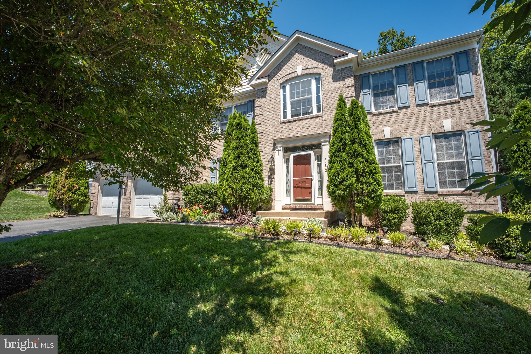 Price Cut $25,000! Welcome Home! Beautiful brick colonial in sought after area of Woodbridge near major commuting routes and VRE. Over 4,700  sqf of living space.  This lovely home backs to trees & along cul-de-sac. Upgraded SS appliances in large open  gourmet kitchen w/island, new granite countertop. 4  spacious bedrooms  and 3 full bathrooms on the upper level, Main level features an office, dining room, living room and bright family room with  cozy gas fire place, half bathroom. Main level laundry room with brand new washer and dryer installed this week. Duel zone HVAC system. 
 Huge walk-out basement features a bedroom, a bonus room , a  rec room.  The basement has a full kitchen, full bathroom,  washer and dryer and a separate entrance that could be rented out for additional income.