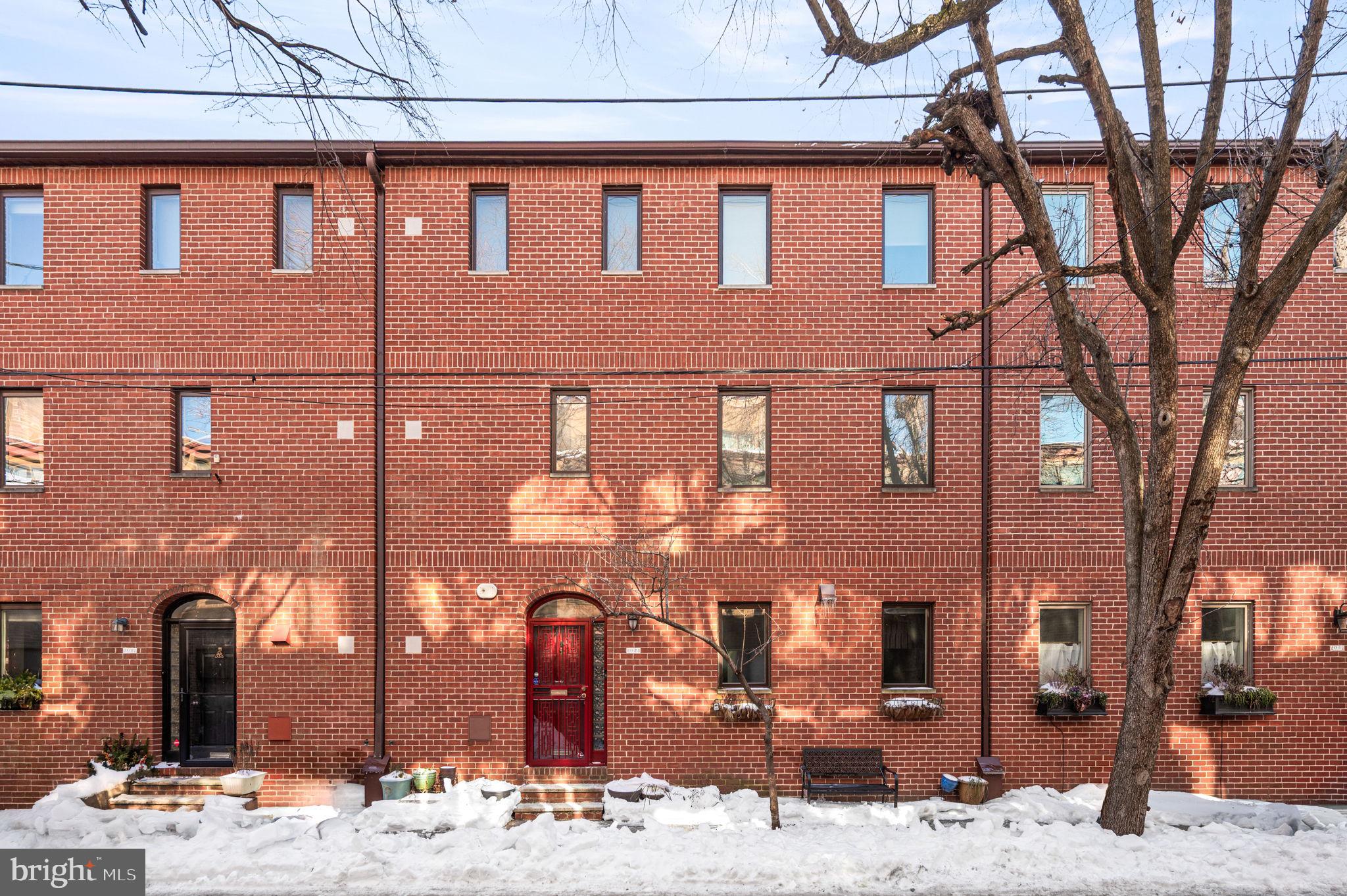 Set on a picturesque street just blocks from Rittenhouse Square, this fully renovated, light-filled home offers 3 bedrooms, an office, a den, and the rare convenience of garage parking. The open-concept first floor is designed for both everyday living and easy entertaining. The kitchen provides generous prep space and soft close cabinetry featuring a 6-burner Viking gas range, Thermador refrigerator/freezer, Bosch dishwasher, deep stainless-steel sink, Viking microwave, and a Sub-Zero refreshment refrigerator. A large island offers additional storage, while a built-in dining bench adds both character and practicality. This level also includes a powder room, a custom-fitted coat closet, and access to a comfortable patio, an inviting extension of the living space. A skylit staircase leads to the second and third floors. The second floor serves as a primary oasis, complete with an office, laundry, den, and a spacious en-suite bath featuring a tiled mosaic shower and a separate soaking tub. A large hall closet adds to the thoughtful storage on this level. The third floor offers two sun-filled bedrooms, including attic access for additional storage in the rear bedroom and an extra zoned air-conditioning system. A shared tiled hall bath features heated floors and a linen closet, along with two additional hall closets for added convenience.
