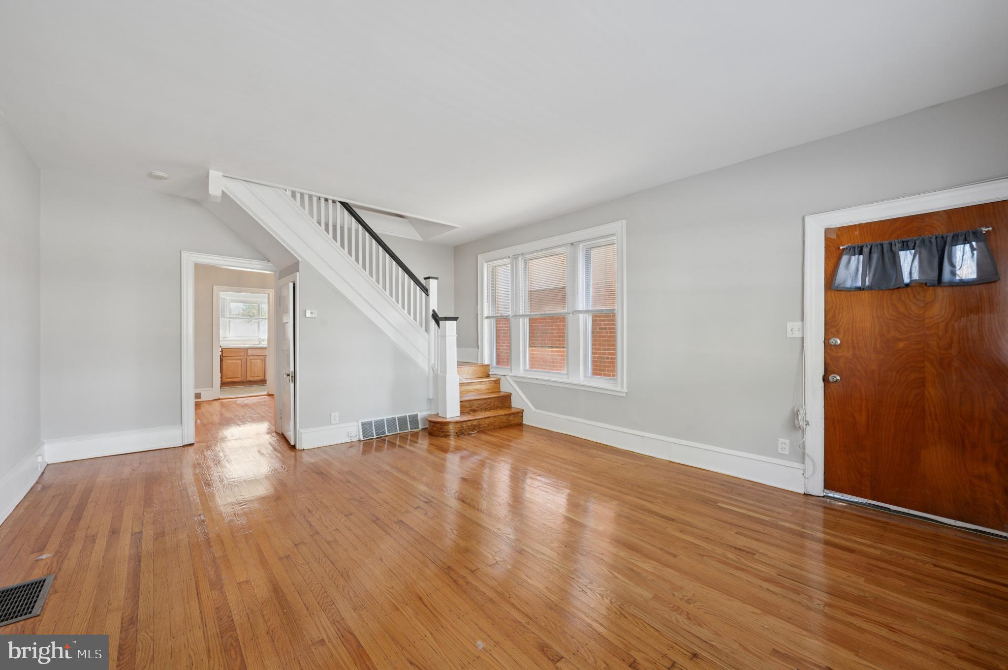 This charming 3 spacious Bedroom, 3 Story Colonial twin home, in the Highland Park neighborhood, offering a perfect blend of classic architecture.  Step inside to discover beautiful hardwood flooring that flows throughout the main living areas, enhancing the home's warm and inviting atmosphere. The dining area is perfect for gatherings, while the kitchen features essential appliances, including a gas oven/range and refrigerator, making meal preparation a breeze. The full basement provides ample storage space and laundry hookups. The exterior of the property has a yard which is viewable from the kitchen window. Highland Park is known for its vibrant community spirit and convenient access to local amenities, which this home provides without issue. Don't miss your chance to experience the charm of classic Highland Park living!