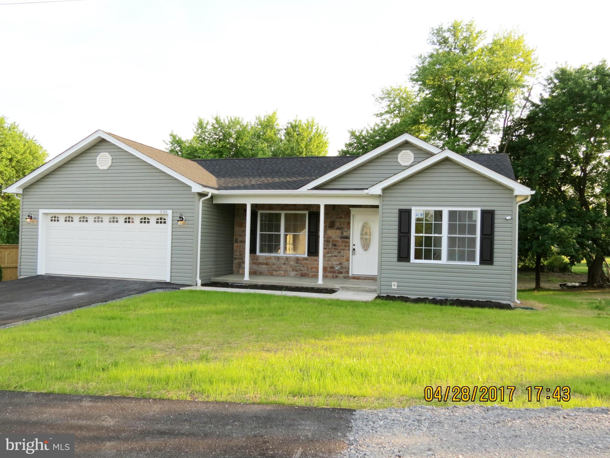 Beautiful Brand New Rancher! Gorgeous open floor plan with cathedral ceiling and with hardwood laminate flooring plus stainless steel appliances and beautiful granite counter tops. Great Location! It is located in the city of Martinsburg. Close to the I-81, Rt.11, Marc train station, recreation center, hospital,  and shopping centers.