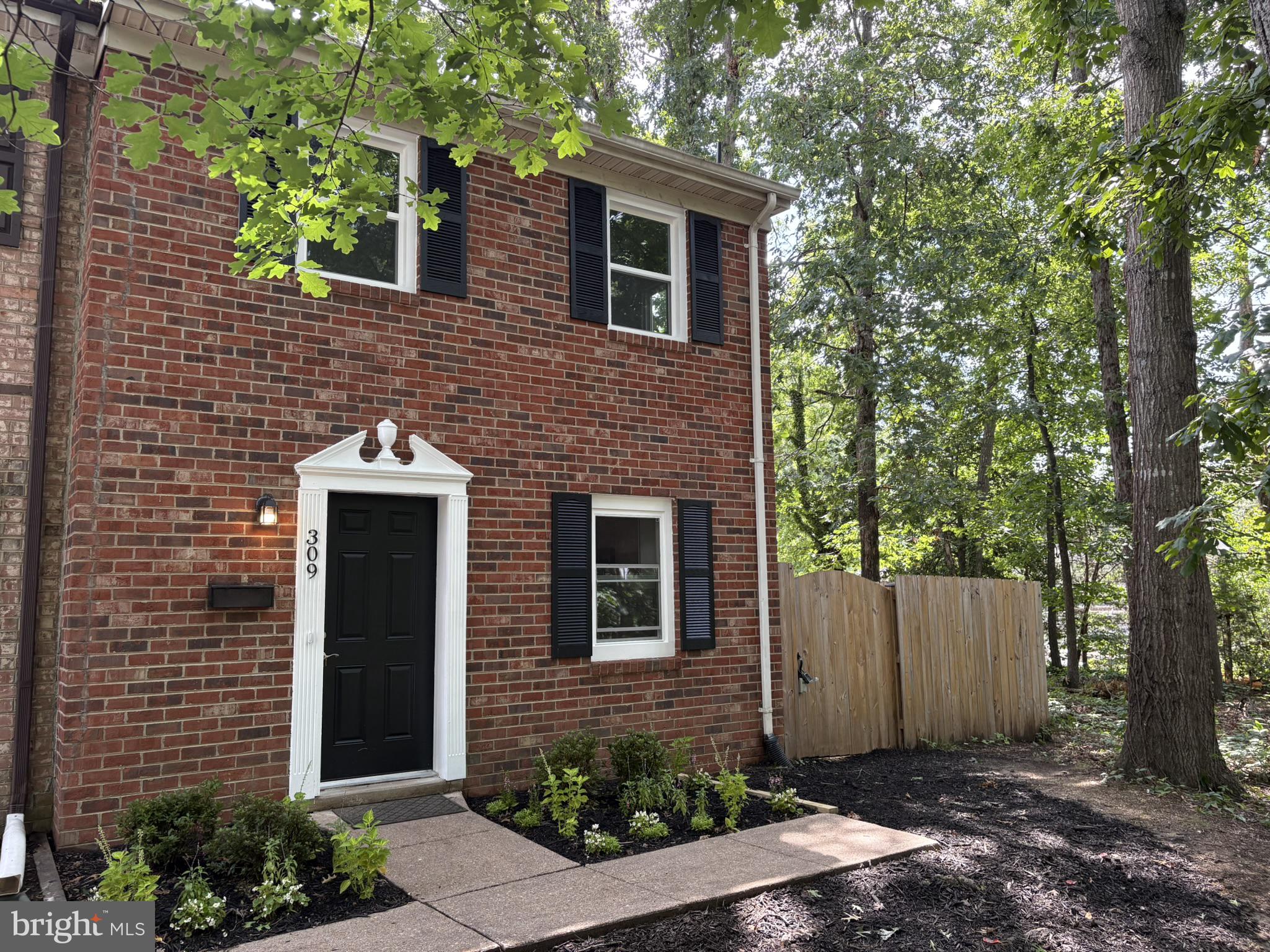 Nestled in the charming Olde Greenwich community, this beautifully renovated end‑unit townhouse offers a rare blend of modern comfort and classic appeal. Every major system and surface has been updated, including a new HVAC and furnace, new water heater, all new windows, and new flooring throughout—LVP on the main level and hallway, with plush carpet in the bedrooms.

The kitchen shines with new cabinets, granite countertops, and stainless steel appliances, all framed by recessed lighting that brightens the entire main level. A new double French door opens to a spacious, partially covered patio, extending your living space outdoors.

Upstairs, the bathrooms have been fully remodeled with ceramic tile, new vanities, and fresh finishes. The home’s traditional floor plan offers three comfortable bedrooms and inviting living spaces with serene views of the adjacent wooded common area.

Outside, a shed with electric and lighting, a 6' privacy fence surrounds an unusually large side and backyard—an exceptional feature for a townhouse—creating a private retreat perfect for relaxing or entertaining.

With its thoughtful upgrades, generous outdoor space, and welcoming community setting, 309 Olde Greenwich is move‑in ready and truly stands out.
