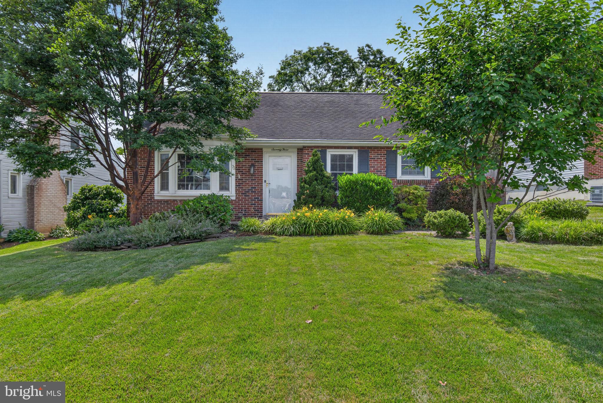 Charming 4-bedroom, 2-bath brick Cape Cod in Millersville offering over 2,400 finished square feet of living space. The main level features a spacious living room with hardwood floors and a classic wood-burning brick fireplace, along with a remodeled kitchen showcasing tile backsplash and newer stainless steel appliances. Completing the main level are three bedrooms with hardwood floors and an updated full bath with a walk-in tiled shower. Upstairs, the private suite offers hardwood floors, custom built-ins, skylights for abundant natural light, and a second full bath. The newly remodeled finished basement provides additional living space and includes a waterproofing system with a lifetime transferable warranty. Enjoy outdoor living from the screened porch and newer composite deck overlooking the private backyard with mature trees. A newly paved driveway leads to an electronic security gate, providing both convenience and privacy while securing the fully fenced rear yard. Additional highlights include newer efficient natural gas heat, central air conditioning, a dedicated ductless mini-split for the upper-level suite, replacement windows throughout, and an architectural shingle roof. Schedule your private showing today!