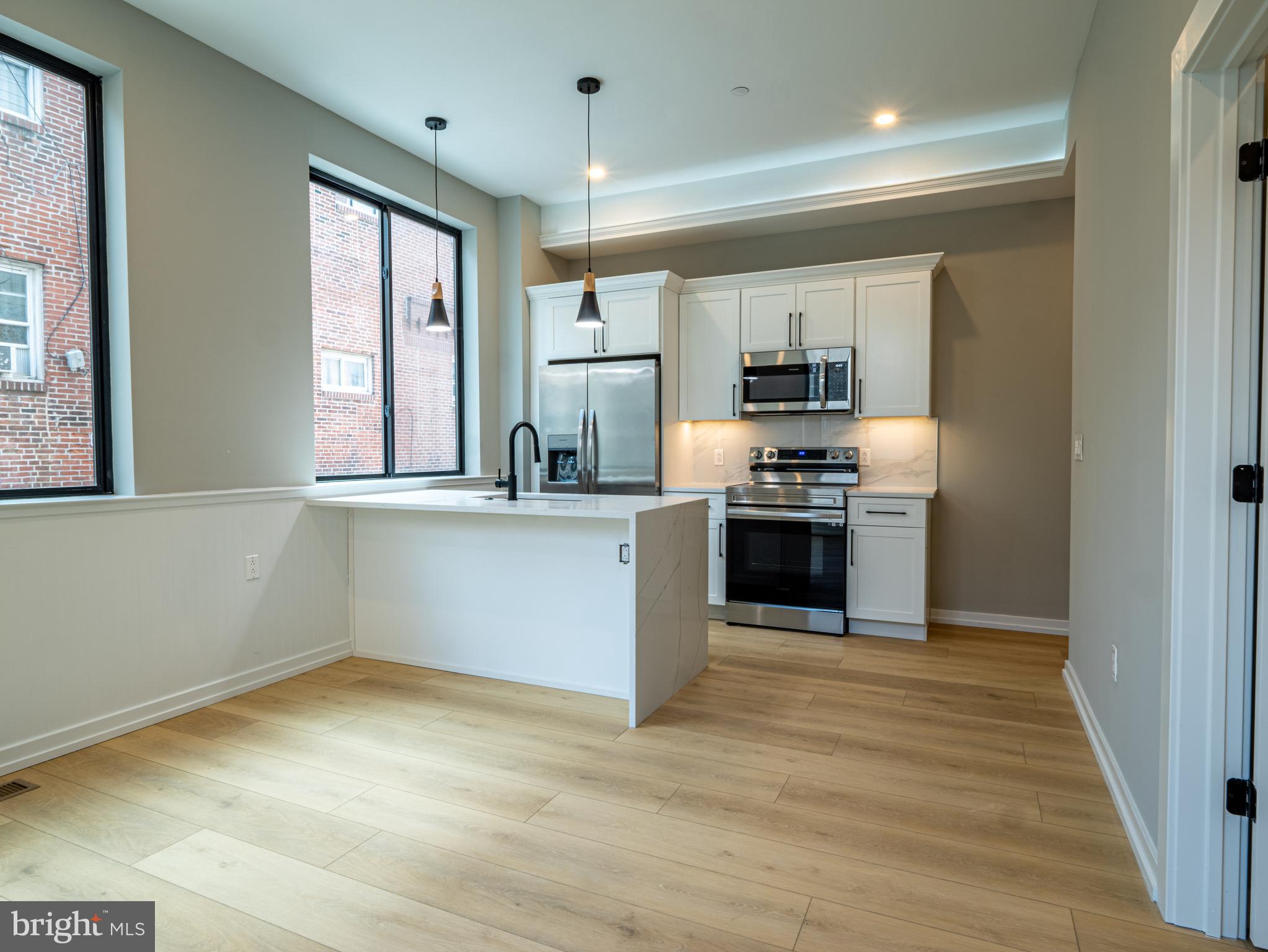 Beautiful brand new construction in the heart of Bella Vista. Kitchen features quartz counters, stainless appliances, and seating at the island. Bright living room with large windows and tall ceilings. Bathrooms feature porcelain tile and large showers with rain shower heads and frameless glass shower doors. In unit laundry. Located in a wonderful neighborhood with a walkability score of 98/100 - walk to the Italian Market, Whole Foods, Sprouts Farmers Market, Angelos Pizzeria, Starbucks, South St, Center City and much more!
