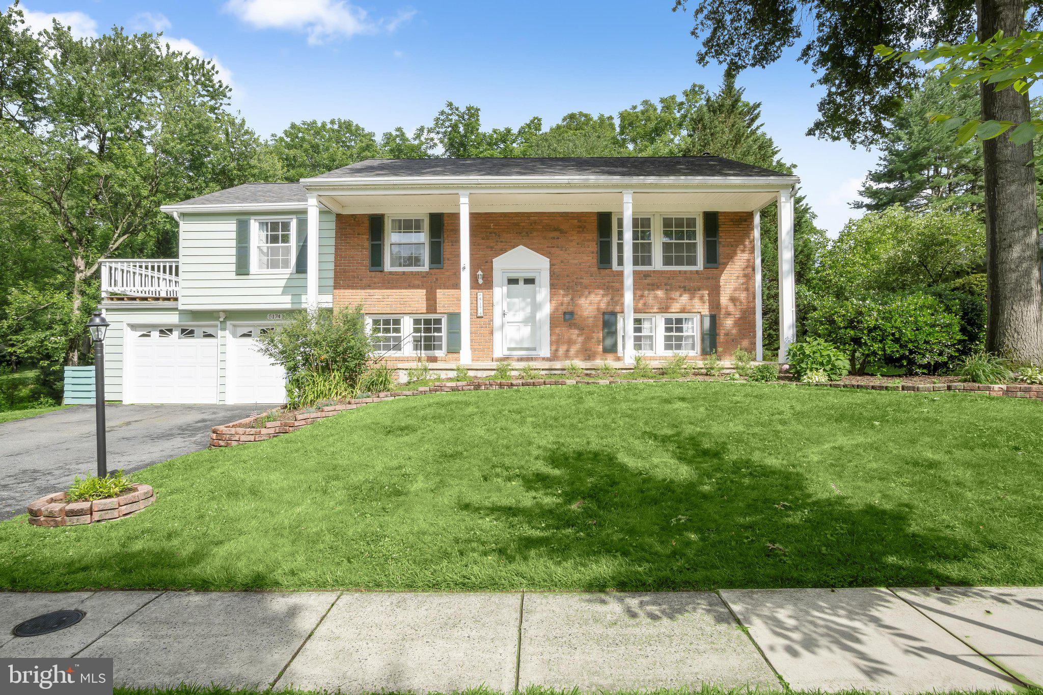 Spacious and beautifully updated home tucked away on a quiet cul-de-sac in vibrant columbia Thoughtful improvements throughout include the roof, bathrooms, kitchen, and more. Rich hardwood flooring spans the entire main level, including all three bedrooms.  The open-concept floor plan features inviting living and dining areas with direct access to an expansive deck, creating an ideal setting for indoor-outdoor living. The renovated kitchen showcases quartz countertops, stainless steel appliances, and ample cabinetry.  The primary suite offers a private balcony retreat and an updated en-suite bathroom. Two additional bedrooms and a beautifully renovated hall bath with a dual-sink granite vanity complete the main level.  The walkout lower level provides exceptional living space with a spacious family room centered around a charming brick fireplace, two additional bedrooms, a full bathroom, and a generous storage area.  Outside, enjoy the peaceful setting from the shaded patio overlooking mature trees and open common space. Nearby hiking trails provide easy access to Wilde Lake and the surrounding natural beauty. Conveniently located near major commuter routes, shopping, dining, and entertainment, this home offers the perfect blend of comfort, updates, and Columbia living.