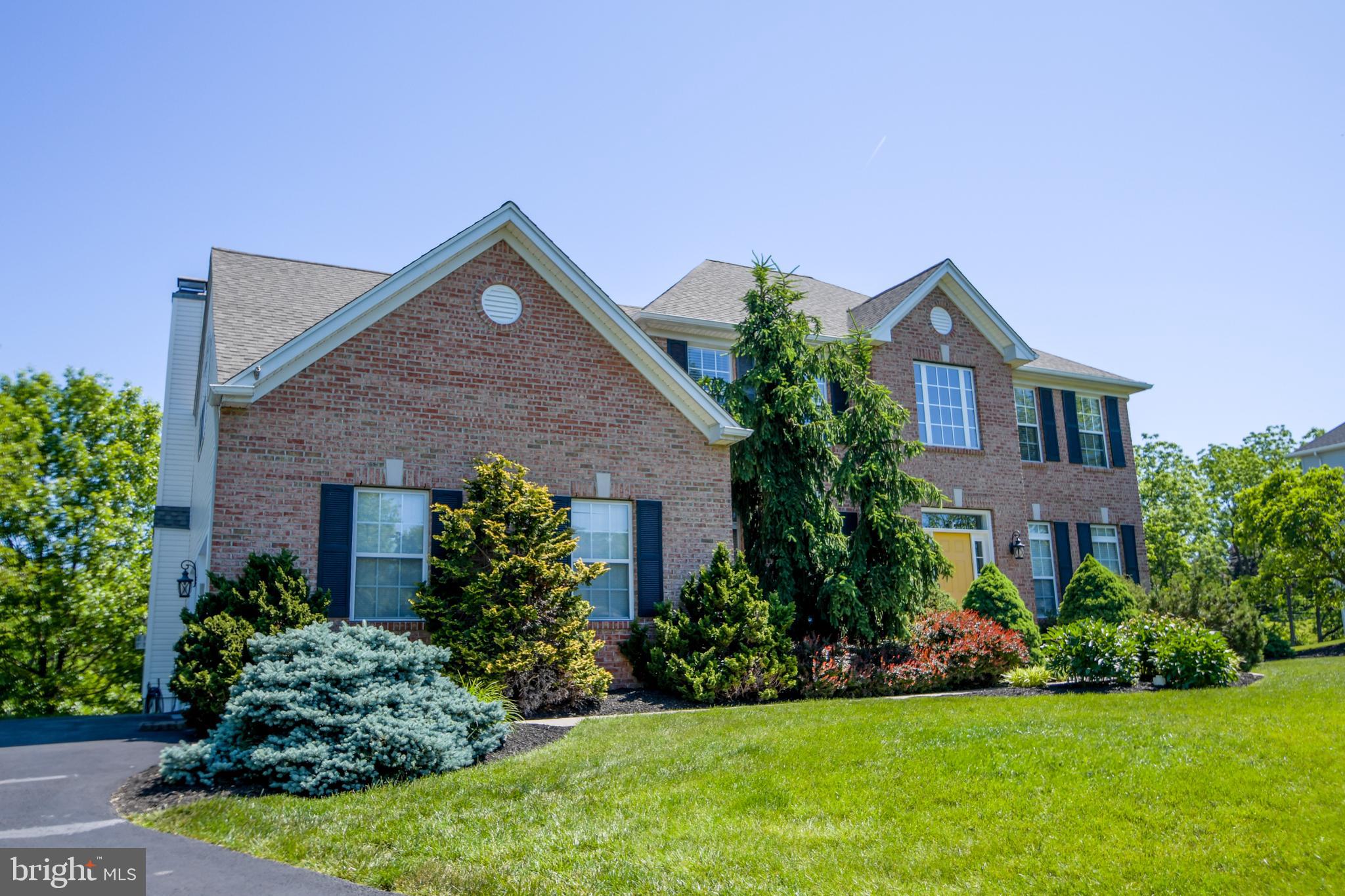 Welcome to 487 Windy Hill Road, a beautifully maintained home located in the highly sought-after Windy Creek community within the award-winning Boyertown Area School District. Built in 2005, this impressive brick-front residence offers approximately 3,025 finished square feet on a spacious 0.35-acre lot, combining comfort, style, and a private, tree-lined setting.
From the moment you arrive, you’ll appreciate the meticulously landscaped grounds and inviting curb appeal that set the tone for this elegant home. Inside, you’ll find a bright, open layout designed for both everyday living and entertaining. The heart of the home is the stunning great room featuring vaulted ceilings and a gas fireplace, creating a warm and impressive focal point.
The newer kitchen is a standout, showcasing granite countertops, a large center island, and 42-inch cabinetry, offering both functionality and timeless style—perfect for cooking, gathering, and hosting.
The spacious primary suite serves as a private retreat, complete with a generous bedroom, sitting area, and a luxurious en-suite bath featuring dual vanities, a soaking tub, and a separate shower. Additional bedrooms provide comfortable accommodations for family or guests.
Step outside onto the expansive rear deck overlooking a peaceful wooded backdrop—ideal for morning coffee, summer gatherings, or simply enjoying the serenity of your surroundings.
The enormous walkout basement offers incredible potential and is currently used as a home gym, but could easily be finished for additional living space, recreation areas, a workshop, or abundant storage.
Conveniently located near shopping, dining, parks, and major commuter routes, this exceptional Windy Creek property delivers space, privacy, and location in one outstanding package. Don’t miss your opportunity to call 487 Windy Hill Road home.