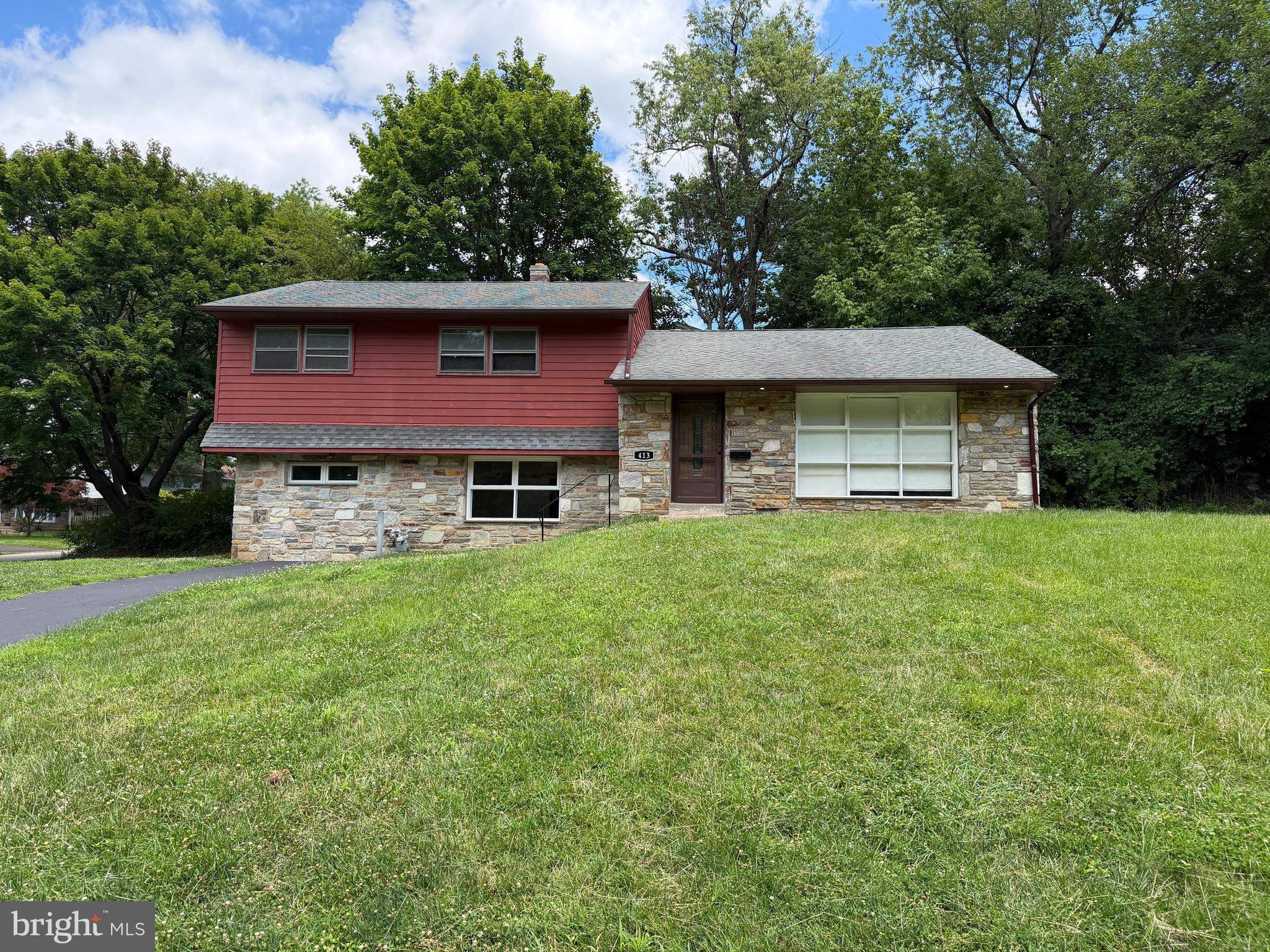 Corner lot of peaceful, tree-lined street, directly across from Melrose Park and playground,  Freshly updated 3bds/ 2.5 bath split- level, with new custom recessed lighting throughout, new kitchen and new flooring. Lots of storage and natural light. The spacious main level boasts an inviting family room, ideal for entertaining or relaxing, with a cozy fireplace that adds warmth and character. The eat-in kitchen is thoughtfully designed with plenty of space for cookingWith a park right across the street, you'll have easy access to green space, a large playground, and recreational opportunities. Additional highlights include a complete home warranty at closing. This home is the perfect blend of space, comfort, and convenience, making it an ideal choice for your next move. Don’t miss the chance to make 413 Asbury Avenue your forever home!
