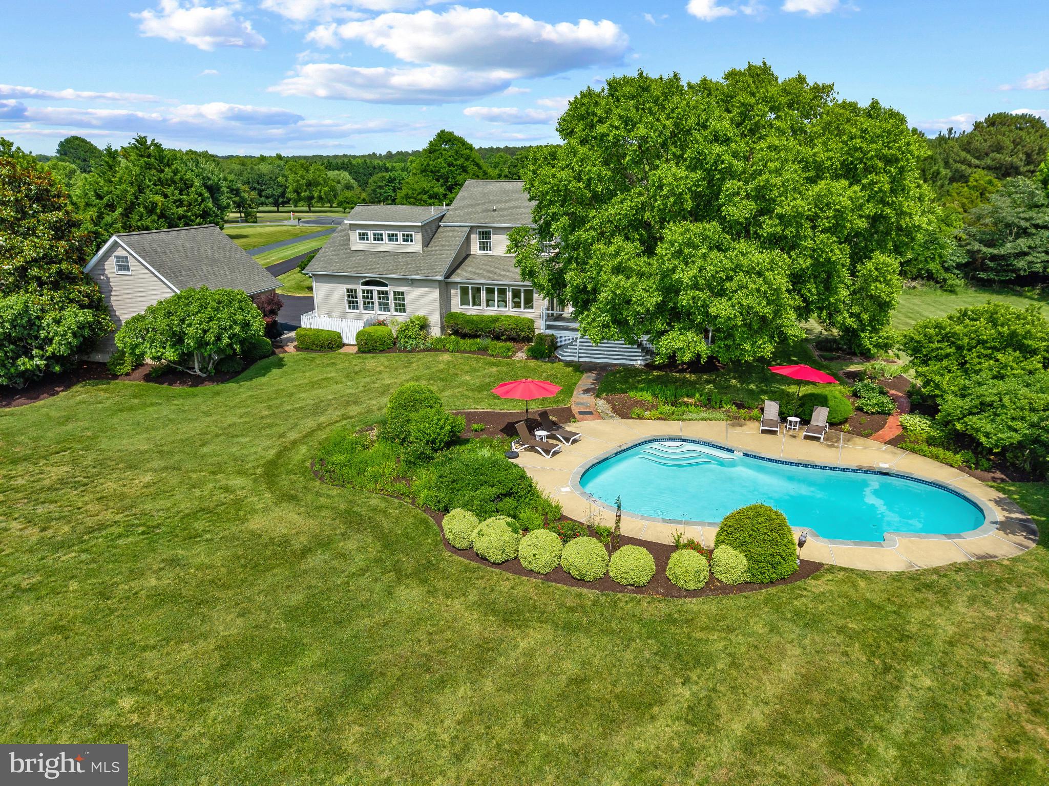 Set along the peaceful shores of Chews Creek, this beautifully renovated waterfront home delivers the quintessential Eastern Shore lifestyle, where spectacular sunsets, endless water views, and effortless indoor-outdoor living take center stage.

Thoughtfully updated throughout, the home offers five bedrooms and four full baths with a layout designed for both comfortable everyday living and exceptional entertaining. Hardwood floors flow throughout the main level, while abundant natural light and an open floor plan create a bright, inviting atmosphere.

At the heart of the home, the gourmet kitchen features a large center island, Silestone countertops, Sub-Zero refrigerator, Viking gas cooktop, Miele built-in espresso maker, beverage refrigerator, stainless steel appliances, and ample space for gathering with all your guests. The kitchen opens seamlessly to the living and entertaining spaces, all oriented to capture beautiful water views.

The main level offers tremendous versatility with a first-floor bedroom, dedicated office space, formal dining room accented by designer wallpaper, and an elegant living room with fireplace. A spacious waterside family room provides the perfect setting to relax, entertain, and enjoy the ever-changing waterfront scenery.

Upstairs, the waterside primary suite serves as a private retreat overlooking the creek. Additional guest accommodations include generously sized bedrooms and a large bunk room ideal for hosting family and friends. Beautifully renovated baths feature custom tile work, dual vanities, and oversized walk-in showers.

Outdoor living is equally impressive. A large waterside deck overlooks the heated and cooled swimming pool, creating a resort-like setting for summer gatherings. Professionally landscaped grounds, mature plantings, and multiple outdoor entertaining areas enhance the property’s relaxed waterfront lifestyle.

Additional highlights include a detached two-car garage, roof less than ten years old, updated finishes throughout, and a setting that showcases some of the most breathtaking sunset views on Maryland’s Eastern Shore.

Whether enjoying a quiet evening by the pool, entertaining guests on the deck, or watching the sun disappear over the water, this exceptional waterfront property offers a rare opportunity to experience Kent Island living at its finest.