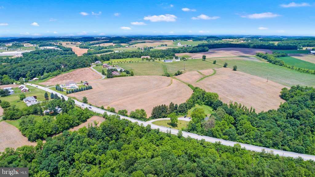 Beautiful Open 23 acres with great location 1 mile to 83. Views of rolling hills! Access off Orwig rd, and includes 1 building right. Currently farmed, and would make a fantastic estate home or farmette.  Super low C&G taxes!  Use 1821 Orwig Rd to find land, look for open space between houses. Another 41 acre parcel available on the south end as well. Clean and Green! Most of 23 acres is open farm land. Site was just perked.  Home and land packages available.