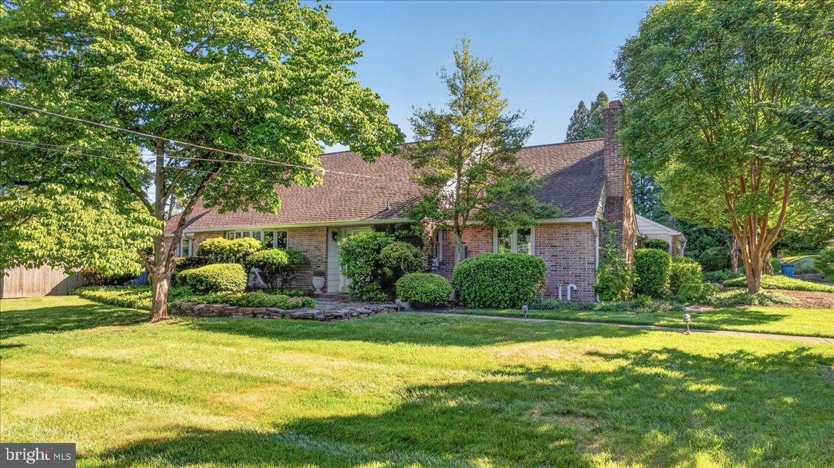 Welcome to 73 Shady Grove Circle, a spacious Colonial offering 5 bedrooms including a desirable first-floor primary suite, providing flexible living options for a variety of lifestyles. Inside, you’re welcomed by a dramatic two-story foyer that sets the tone for the home’s light-filled, comfortable layout. Fresh paint and hardwood floors run through much of the main level, giving the interior a clean, cohesive feel that’s both warm and move-in ready. The heart of the home is the character-filled kitchen, featuring a unique Vestal Mfg. Co. stove, well-maintained appliances, and plenty of workspace for everyday cooking or entertaining. Thoughtful storage is found throughout, including generous areas in the basement and upstairs—ideal for stowing away seasonal décor, sports gear, and all of life’s extras. Practical features like a full-home propane generator add peace of mind and year-round convenience, while multiple living and dining areas create an easy flow for daily life and gatherings.

Beyond the interior, the property opens to unforgettable outdoor living. The grounds are uniquely charming, with winding garden beds, beautiful bushes, and established trees that create a warm, storybook setting around the pool and pool house. An inviting pool house seating area functions as an outdoor living room, and thoughtfully planned landscaping creates natural “rooms” for lounging, dining, and entertaining. All of this is just a short drive from Doylestown Borough, with convenient access to Routes 611 and 202 for commuting, shopping, and dining. An attached oversized two-car garage completes the property, offering ample room for vehicles, storage, and hobbies, and reinforcing the home’s rare blend of comfort, character, and resort-style amenities right at home.