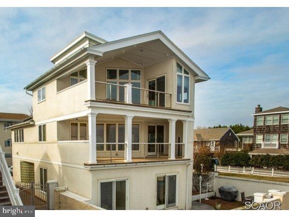 Rarely Offered Oceanfront Home In Sought After Sea Gate Village. Spectacular Ocean Views, Open Floorplan, Abundance Of Natural Light, Private Walled Patio & Garden. Community Features 2 Oceanfront Pools, Gorgeous Clubhouse & Tennis Create One-Of-A-Kind Beach Experience. Complete Renovation 2001.