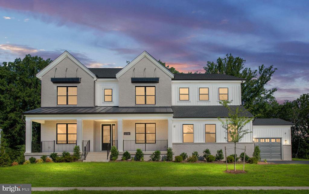 A Rare Opportunity in Sold-Out Mt. Prospect
Don't miss this unique chance to own a brand-new Parkhurst Fairview in the highly sought-after and sold-out Mt. Prospect community of N. Potomac. Perfectly situated in one of Montgomery County’s most desirable neighborhoods, this stunning home offers access to top-rated, prestigious public and private schools, making it an ideal choice for families seeking excellence in education and lifestyle.
This exceptional residence has been thoughtfully crafted to meet the needs of every member of your household—offering luxury, comfort, and functionality in every detail.
Step into the inviting foyer, where a tray ceiling adds a touch of elegance and sets the tone for the home’s warm and welcoming atmosphere. Flanking the foyer are a formal dining room and a versatile flex room—perfect for entertaining guests or relaxing with family.
At the heart of the home lies the beautifully appointed gourmet kitchen, a true chef’s dream. It features professional-grade appliances, a generous center island with breakfast bar, abundant counter and cabinet space, a spacious walk-in pantry, and a bright, casual dining area. Whether you're preparing a quick weeknight meal or hosting a dinner party, this kitchen is ready for any occasion.
From the great room, step through 12’ multi-panel stacking doors onto a stunning luxury deck featuring an elegant outdoor fireplace—perfect for year-round entertaining. What truly sets this home apart is the privacy and serenity offered by the deck backing directly to protected parkland. Enjoy peaceful mornings and unforgettable evenings in your private outdoor sanctuary—no neighbors in sight, just open space and nature at your doorstep.
Below, a spacious covered patio offers a peaceful retreat with direct access to the backyard and finished basement, creating a seamless blend of indoor and outdoor living.
Retreat to the luxurious primary bedroom suite, where comfort meets sophistication. Highlights include dual walk-in closets, a sitting area, and a spa-inspired ensuite bath with dual vanities, a free-standing tub, a glass-enclosed shower with built-in seating, a linen closet, and a private water closet.
Each secondary bedroom is designed for comfort and privacy, featuring its own walk-in closet and full private bath. For added convenience, a main-level guest bedroom also includes a full bath—ideal for overnight visitors or multi-generational living.
Practical touches throughout the home include an everyday entry from the 4-car garage, a centrally located 2nd floor laundry room, a spacious loft, and abundant storage throughout to support your busy lifestyle.
The expansive finished basement provides even more living space, complete with a private bedroom, full bathroom, media room, and built-in bar—perfect for entertaining or simply relaxing with family and friends.
This is more than a home—it's a lifestyle. Schedule your private tour today and discover the unmatched value, location, and luxury of this one-of-a-kind Mt. Prospect gem before it's gone.