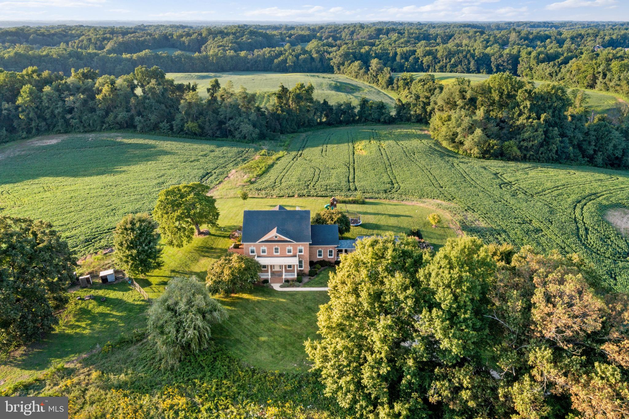 A Unique Opportunity Awaits! Own 138 acres of picturesque farmland, complete with a Manor House, Farmhouse, and Tenant House, across two parcels (5622 & 5628 Greenock Road) being sold together under separate tax IDs.

5622 Greenock Road boasts a beautifully maintained manor home set on a professionally landscaped 1-acre lot with breathtaking views of the rolling fields. Featuring a main-level bedroom, a gourmet kitchen, a serene screened porch, and a stone patio with a cozy fire pit—perfect for outdoor gatherings. Inside, the home offers abundant storage, a spacious upper-level laundry room,  a convenient mudroom, and a large walk-out finished lower level ideal for entertaining or a potential in-law suite. The property also includes a 2-car garage with a bonus room above,  an irrigation system, and a security system for peace of mind.

5628 Greenock Road spans 137 acres and includes a charming 1920's farmhouse (4 bedrooms & 2 full bathrooms), tenant house, and additional barns. The farmhouse is currently occupied by a tenant who will vacate upon settlement, offering income potential or flexibility for future use.

Don’t miss this rare chance to own an estate with endless possibilities!