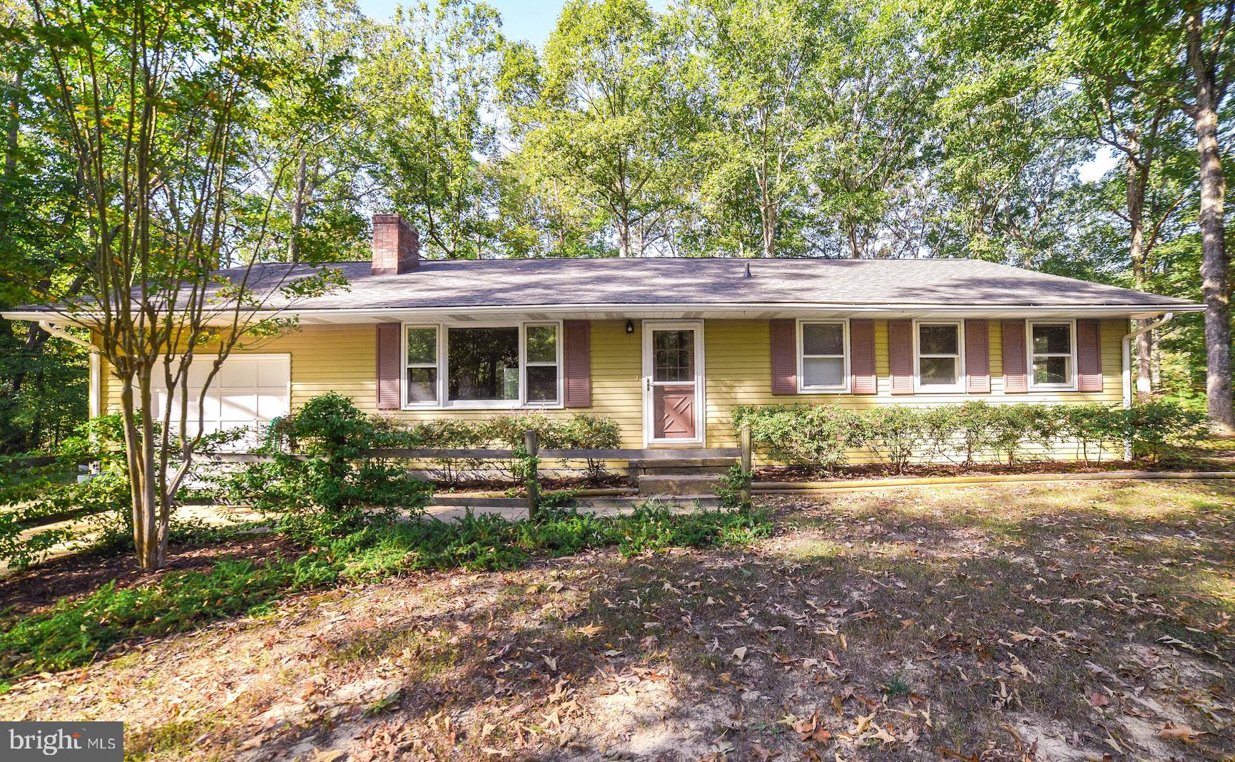 Great rambler on a 1.9 acre corner lot in Leonardtown.  Privacy surrounds this one.  Three generously sized bedrooms and  2 full baths. Kitchen was recently redone with Kraftmaid cabinets, soft close drawers, stainless steel appliances. Family room with fireplace, and one car attached garage.  Two sheds, one used as workshop. Great location!!