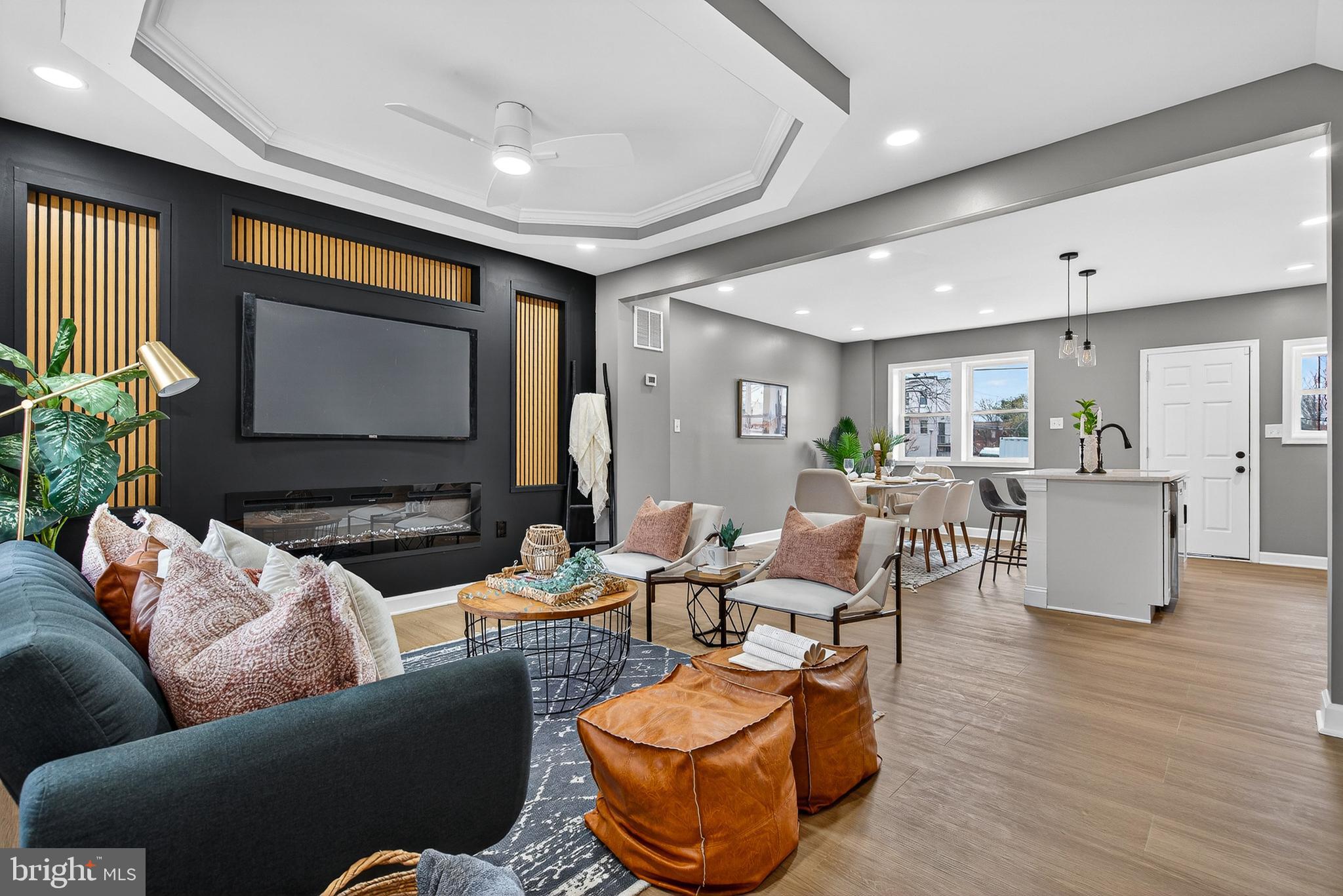 Here's your second chance to own this beautiful home! The previous contract fell through due to circumstances unrelated to the seller or the property.
This stunning fully renovated home features 4 bedrooms and 2 bathrooms. Conveniently located near Pimlico Race Course, I-83, Sinai Hospital, shopping, dining, schools, and public transportation. The main level offers a bright open-concept layout, recessed lights with a modern slat-panel media wall and a built-in electric fireplace. The kitchen features new cabinets, quartz countertops, stainless steel appliances, and a kitchen island. The upper level includes three nicely sized bedrooms and a beautifully updated full bathroom. The finished basement provides a versatile fourth bedroom, complete with a remodeled full bathroom, washer and dryer hook ups and a walkout exit. Exterior features include a welcoming front porch and a rear parking pad . This home is move-in ready and upgraded throughout, schedule your showing today!
