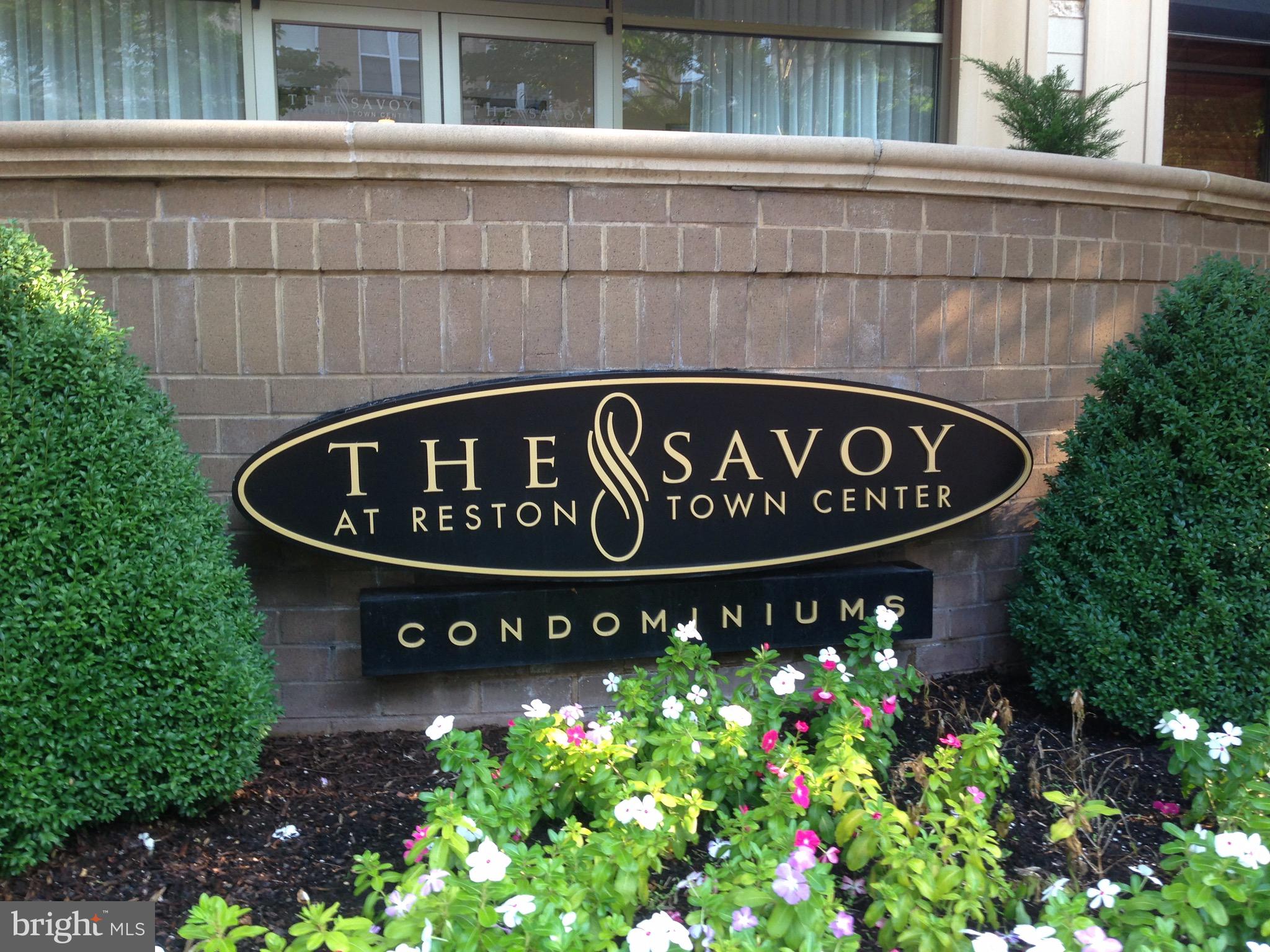 If luxury is what you're looking for...Fabulous & SUNNY 3 Bedroom/2 bath CORNER condo with lots of windows @ The Savoy/Reston Town Center!  Gourmet KIT w/granite, SS appliances & breakfast bar, Beautiful hardwoods throughout, ceramic baths & ideal PRIVATE location w/courtyard & pool views, quick access to parking-TWO RESERVED Garage spaces next to each other,  large indoor storage room included in rent--SUPER community amenities + WALK to everything at Reston Town Center...Dining, Movies, Shopping, Events & More!  Reston Town Center metro stop is just 2 blocks away,  WO&D Bike Trail access just around corner and Dulles International Airport is approx. 8 miles away (or take the metro)!